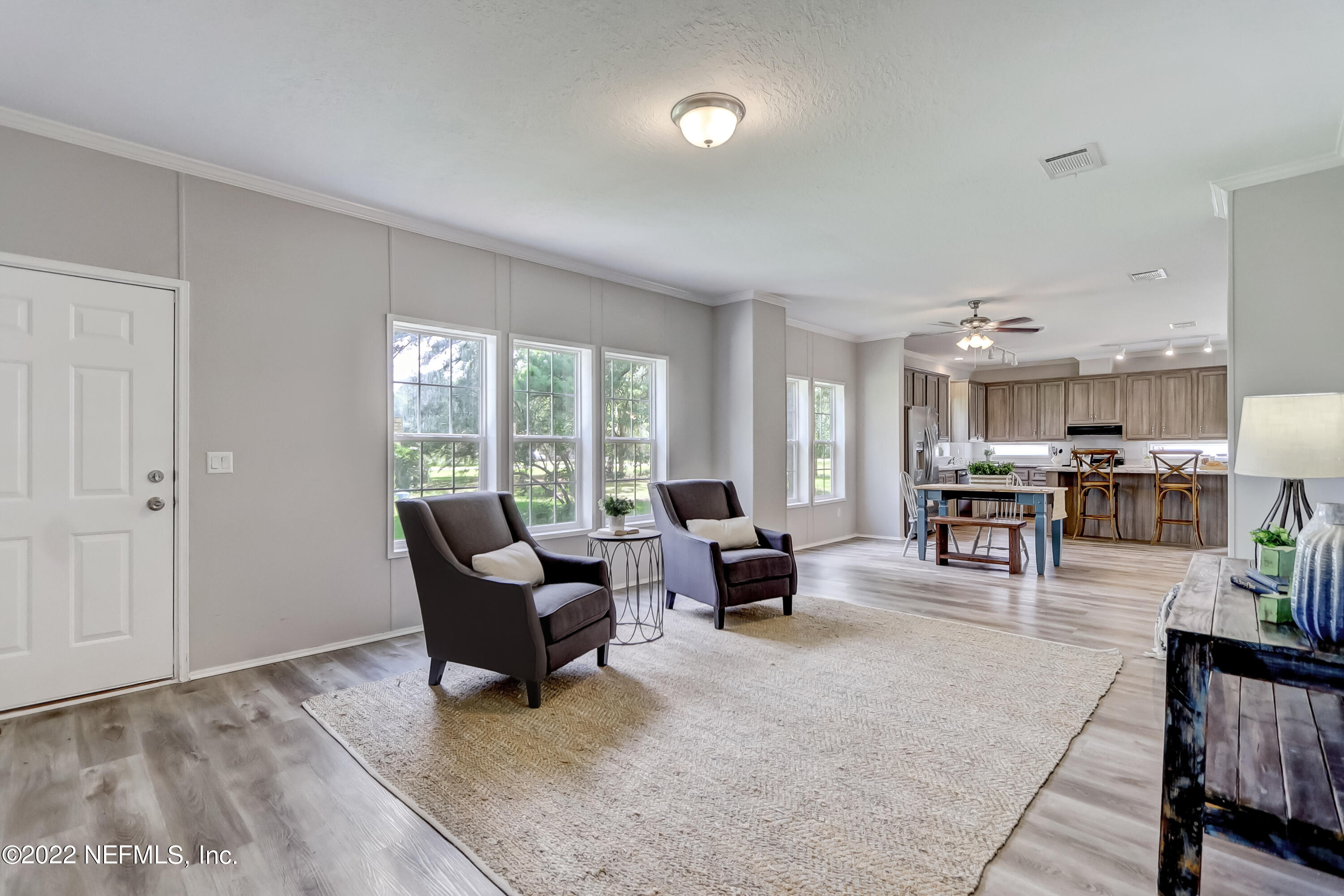 54267 Heller Road Callahan, FL 32011 - Photo 6 of 37 a living room with furniture and a table