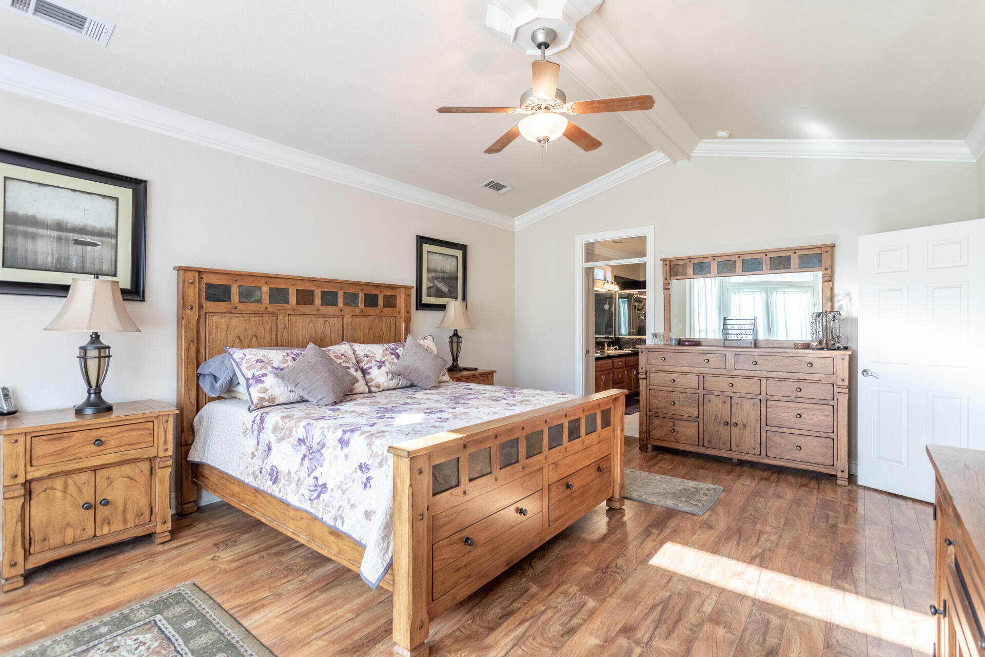 2877 Green Riffle Road Redding, CA 96002 - Photo 16 of 37 a bedroom with a bed and a dresser