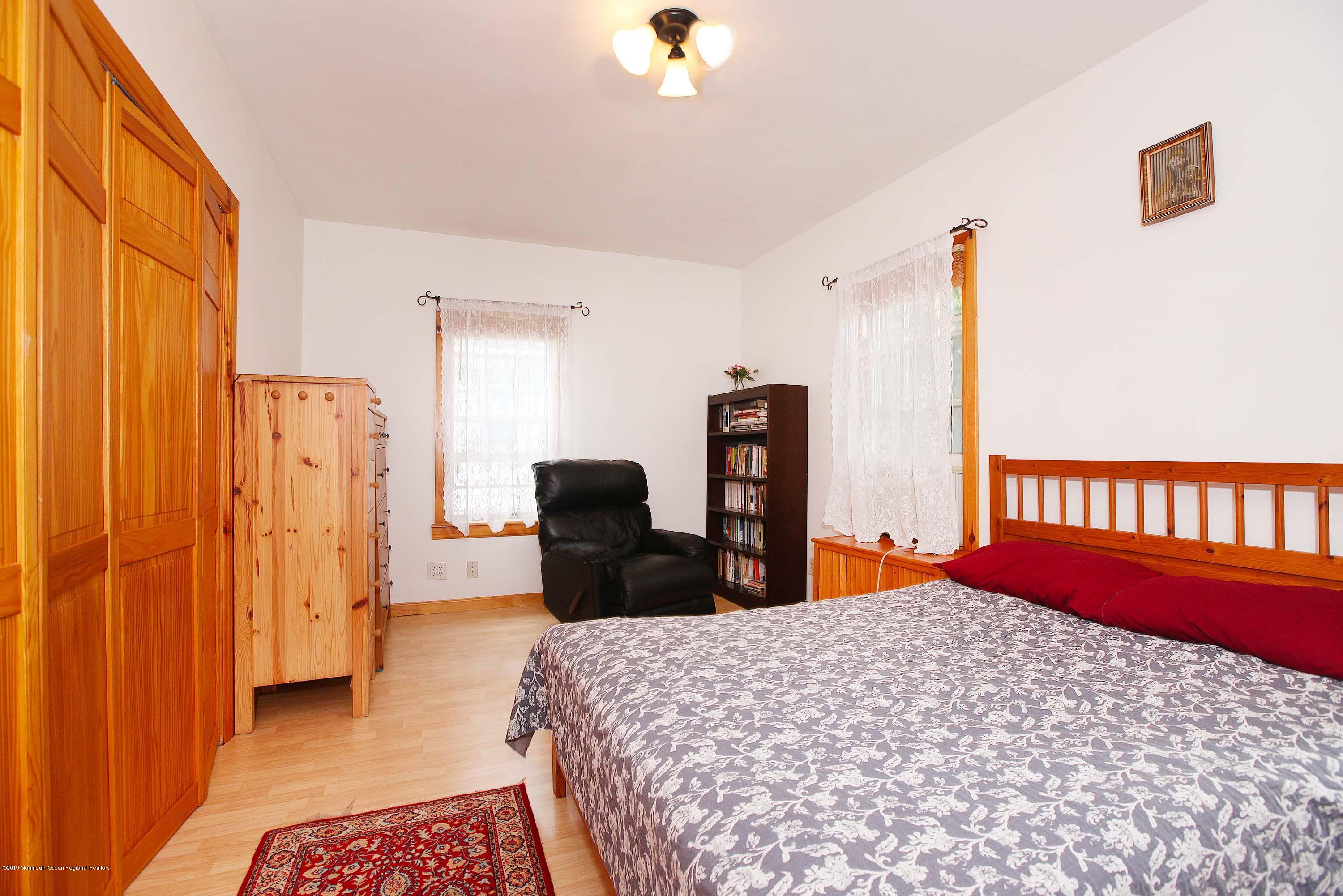 210 Hillside Road Linden, NJ 07036 - Photo 14 of 25 a bedroom with a bed dresser and a window