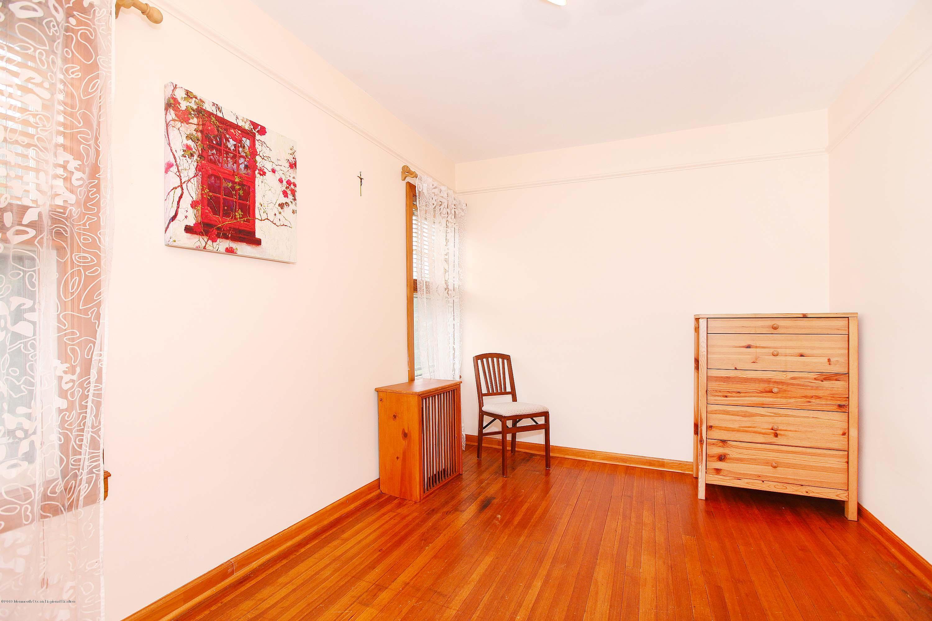 210 Hillside Road Linden, NJ 07036 - Photo 16 of 25 a view of a room with furniture and wooden floor