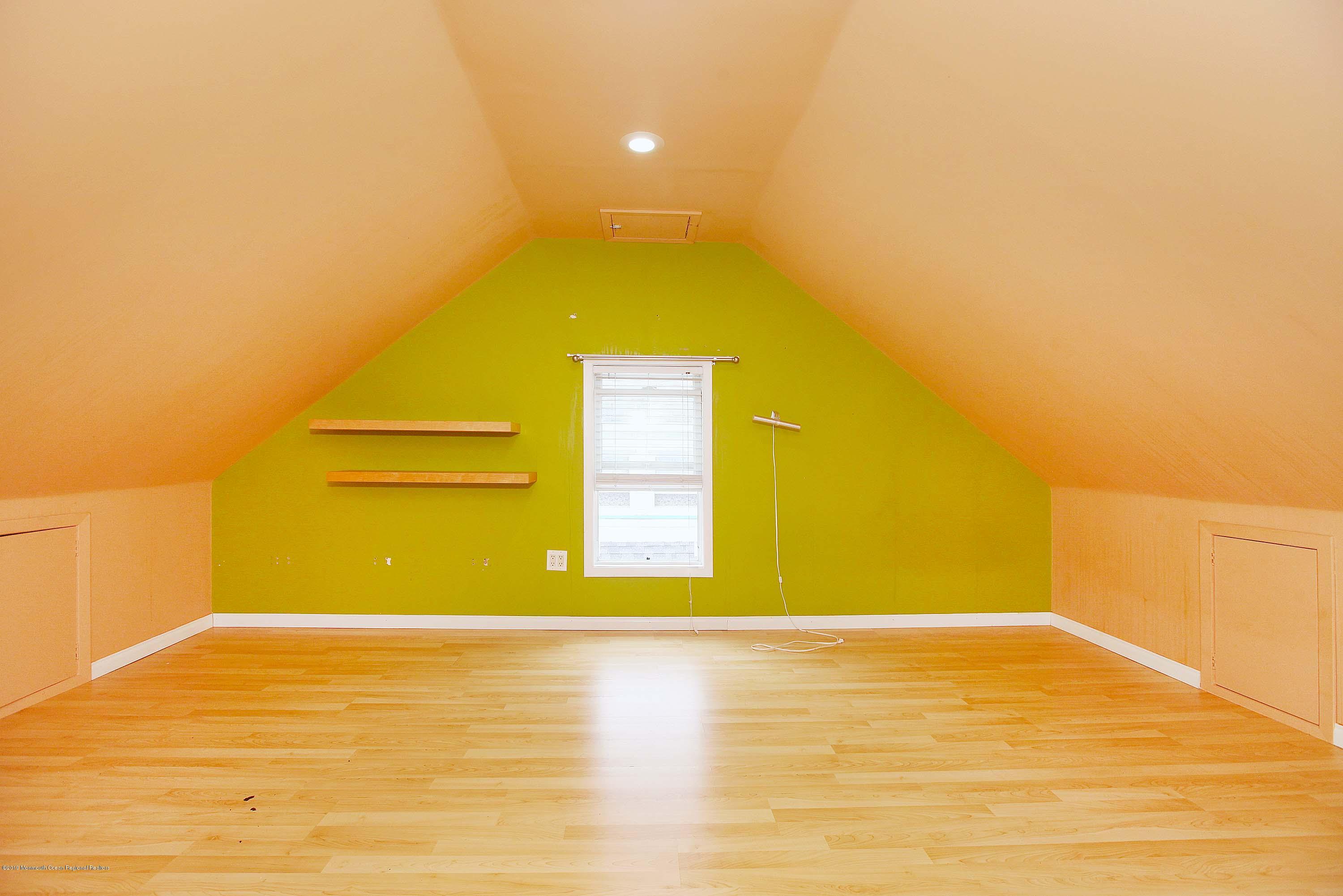 210 Hillside Road Linden, NJ 07036 - Photo 21 of 25 a view of a big room with wooden floor