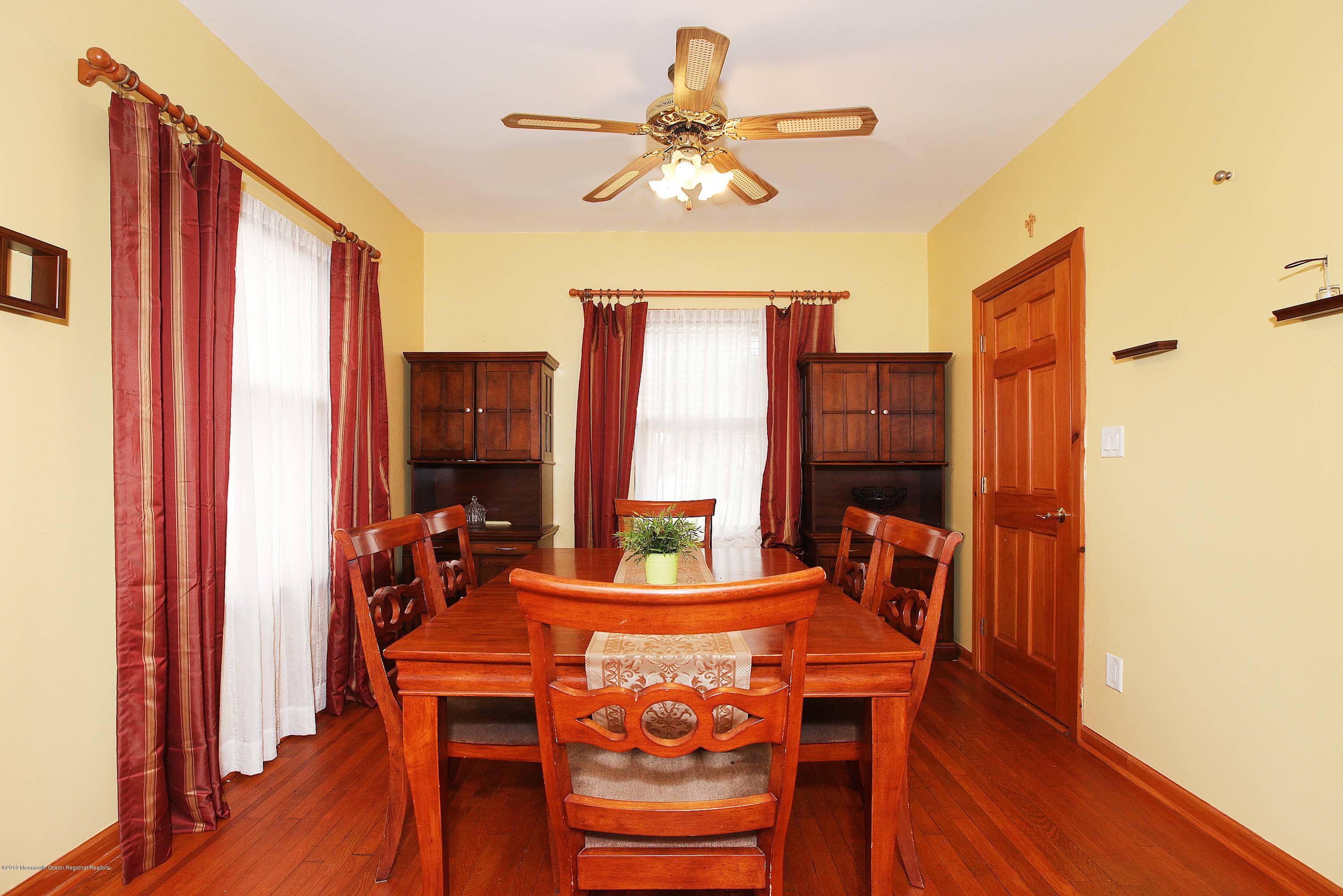 210 Hillside Road Linden, NJ 07036 - Photo 9 of 25 a view of a dining room with furniture window and wooden floor