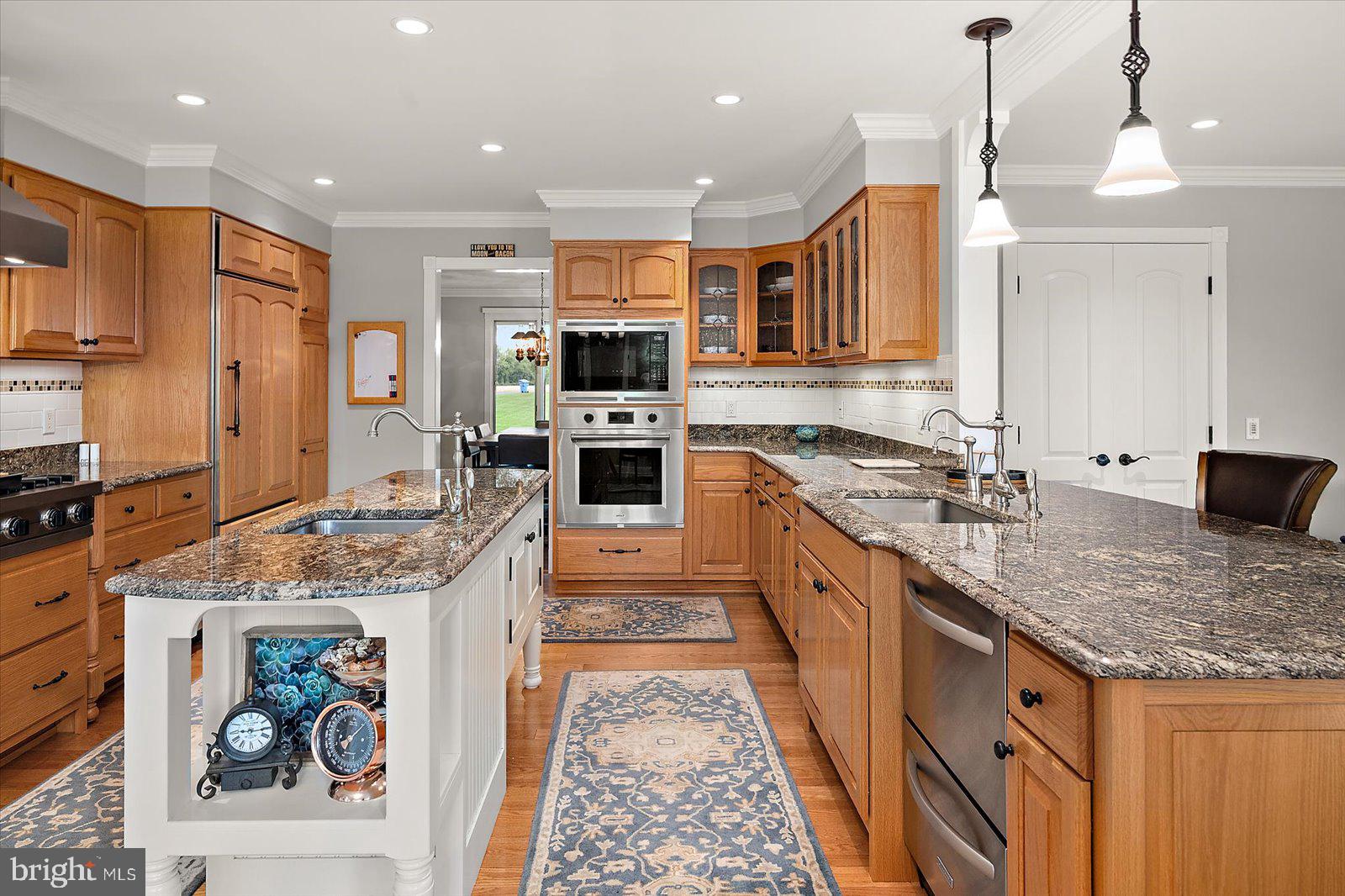 33915 Shockley Road Parsonsburg, MD 21849 - Photo 49 of 125 Elegant kitchen with rich wood tones.