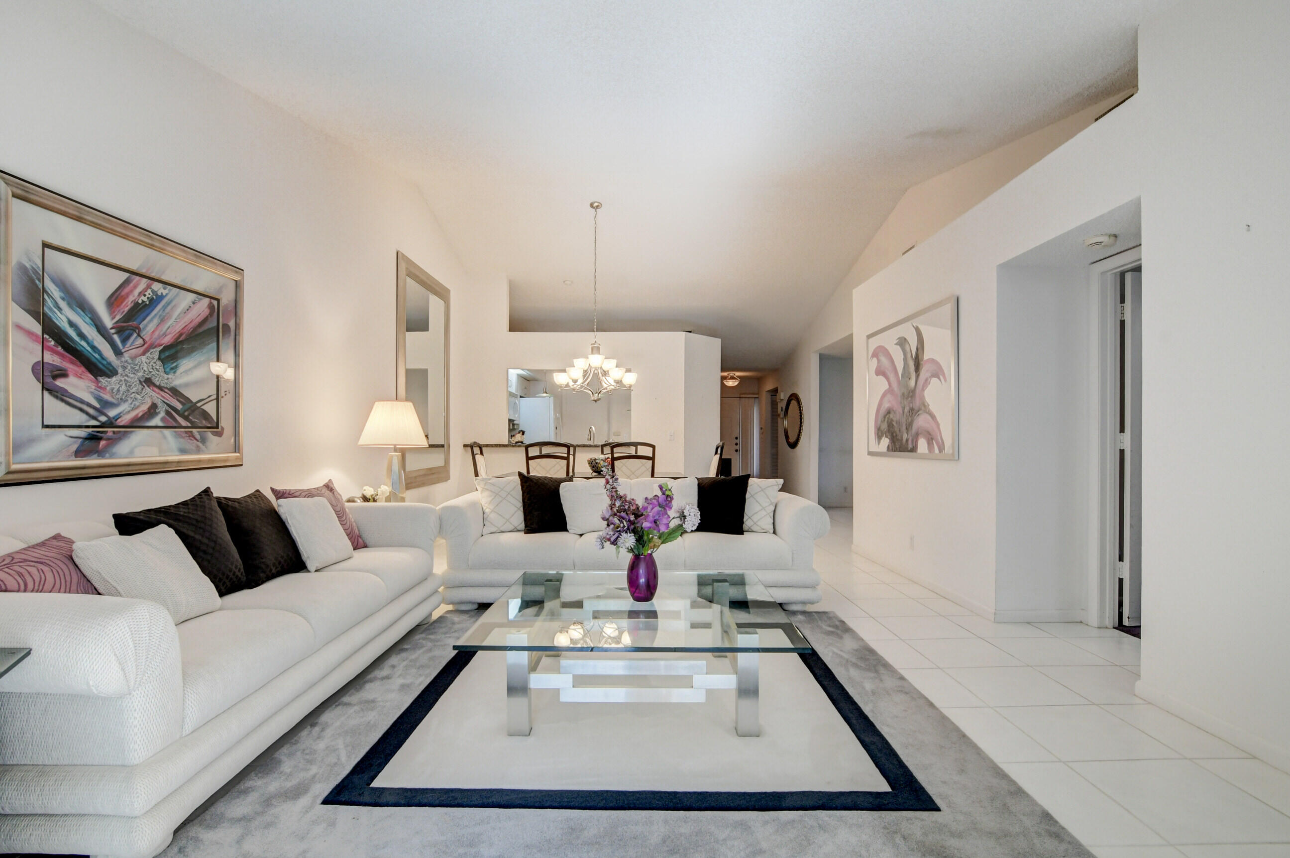 7566 Red Ruby Drive Delray Beach, FL 33446 - Photo 13 of 44 a living room with furniture and a rug