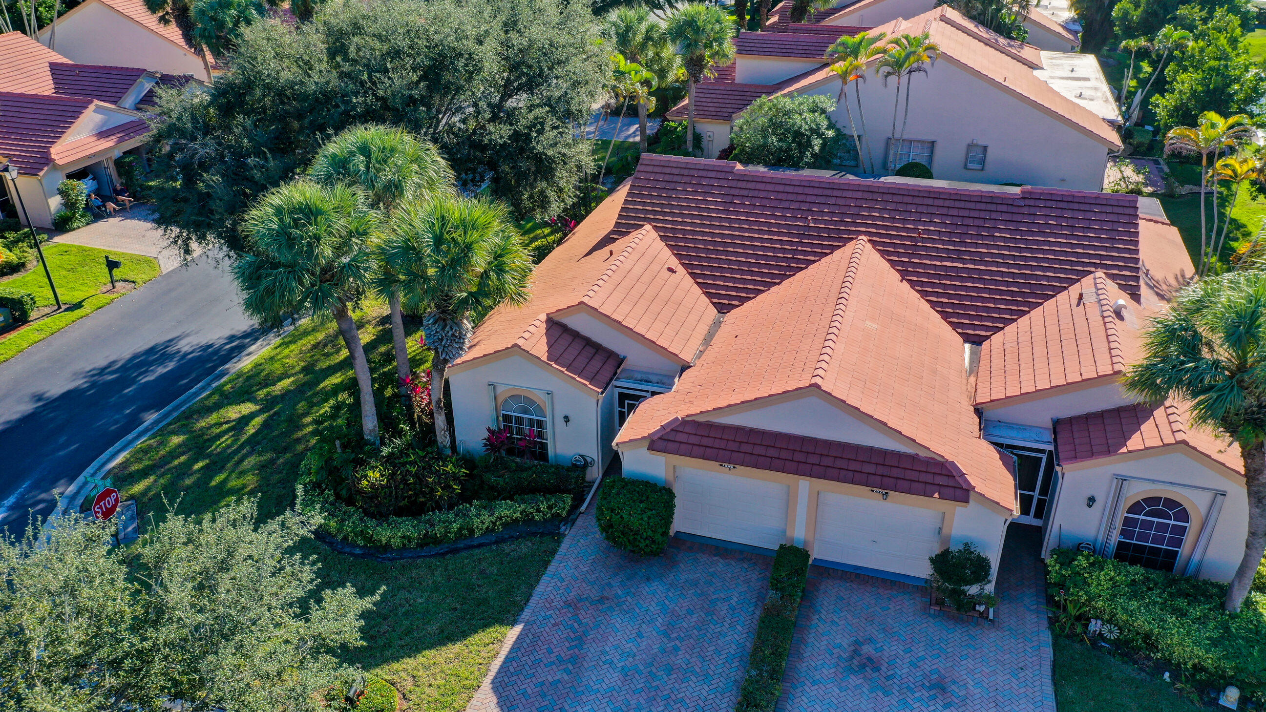 7566 Red Ruby Drive Delray Beach, FL 33446 - Photo 2 of 44 a aerial view of a house with a yard