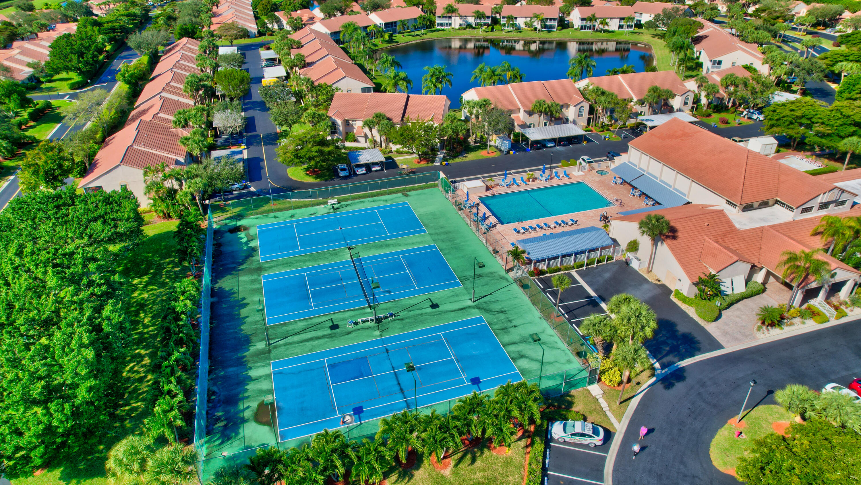 7566 Red Ruby Drive Delray Beach, FL 33446 - Photo 44 of 44 an aerial view of a houses with yard