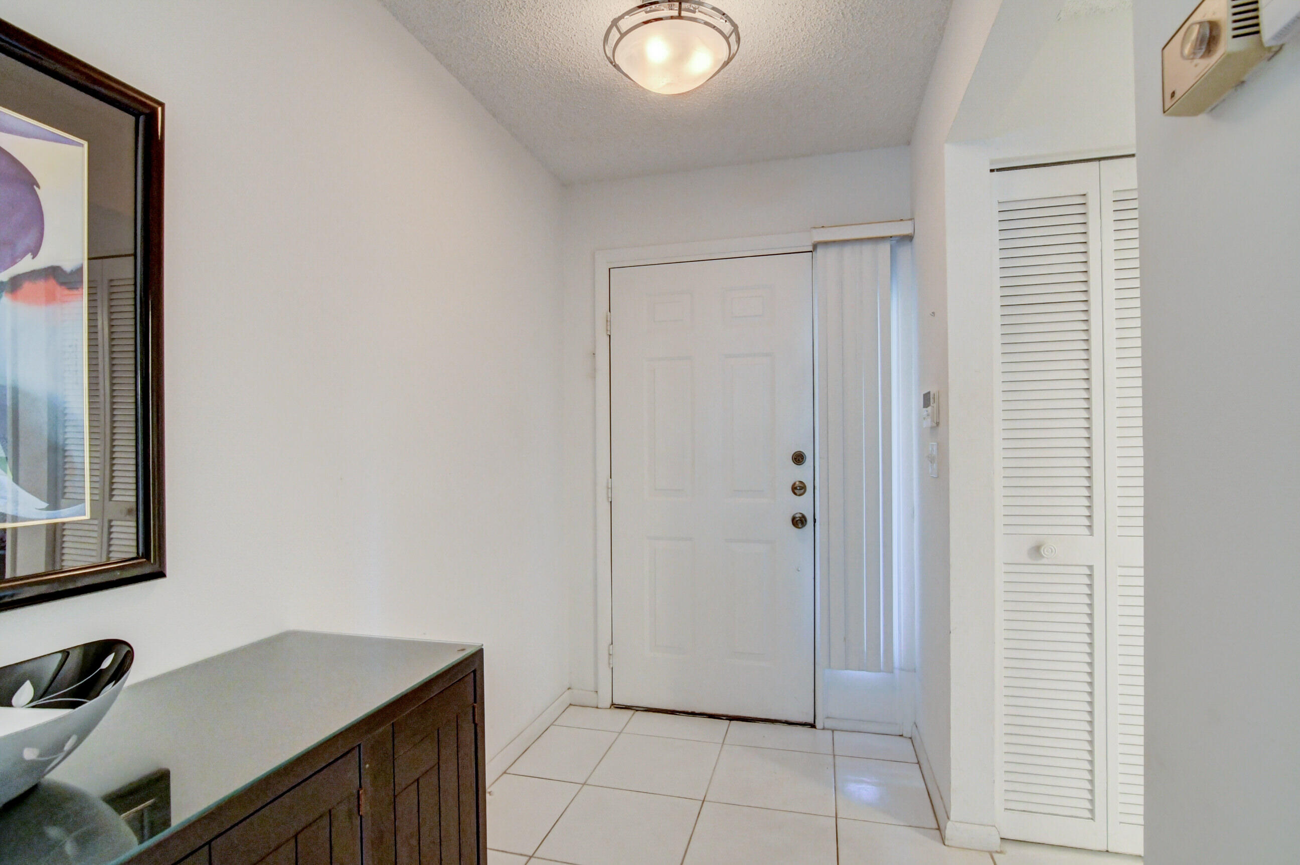 7566 Red Ruby Drive Delray Beach, FL 33446 - Photo 8 of 44 a view of a storage & utility room in a room