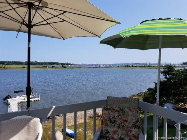 a view of a lake from a balcony