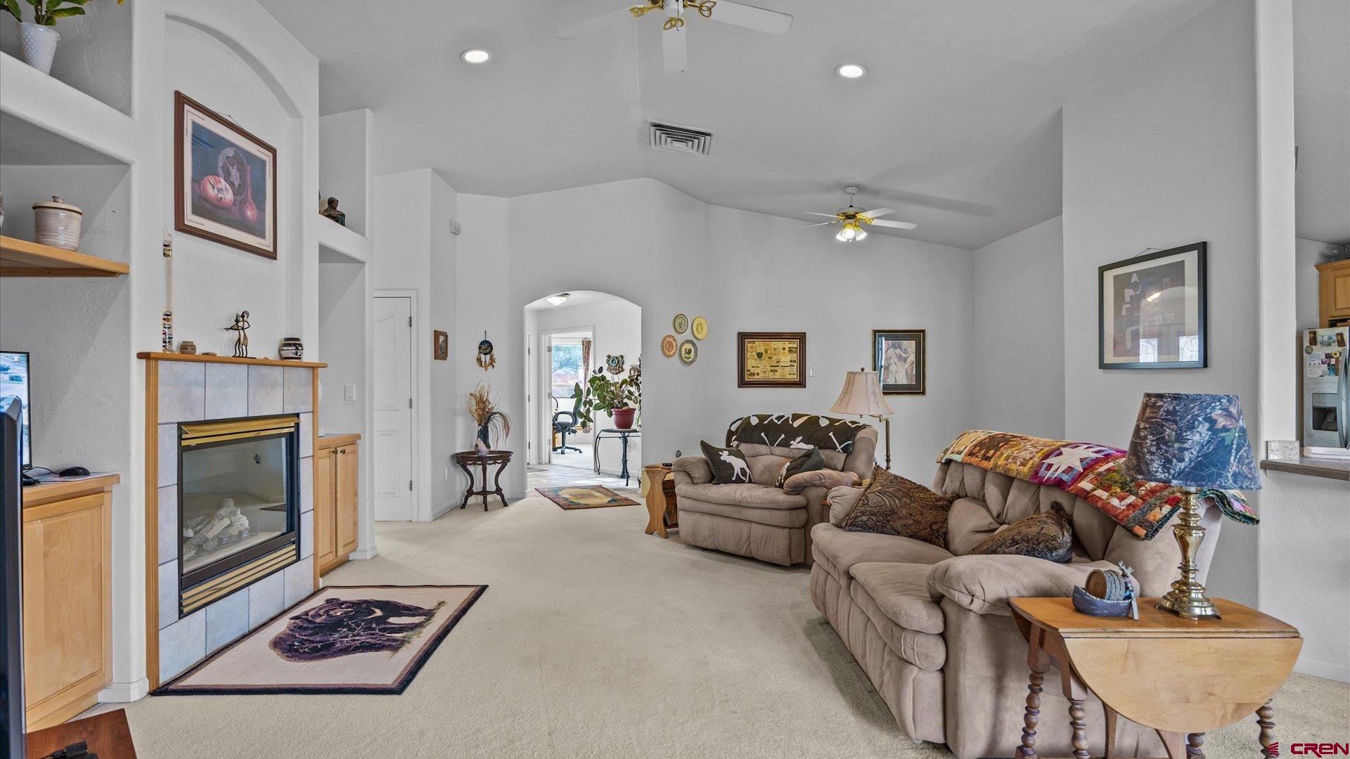18 Willow Creek Court Parachute, CO 81635 - Photo 12 of 31 a living room with furniture and a fireplace