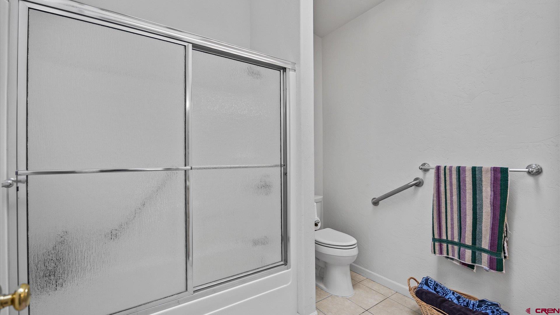 18 Willow Creek Court Parachute, CO 81635 - Photo 26 of 31 a bathroom with a shower and a toilet