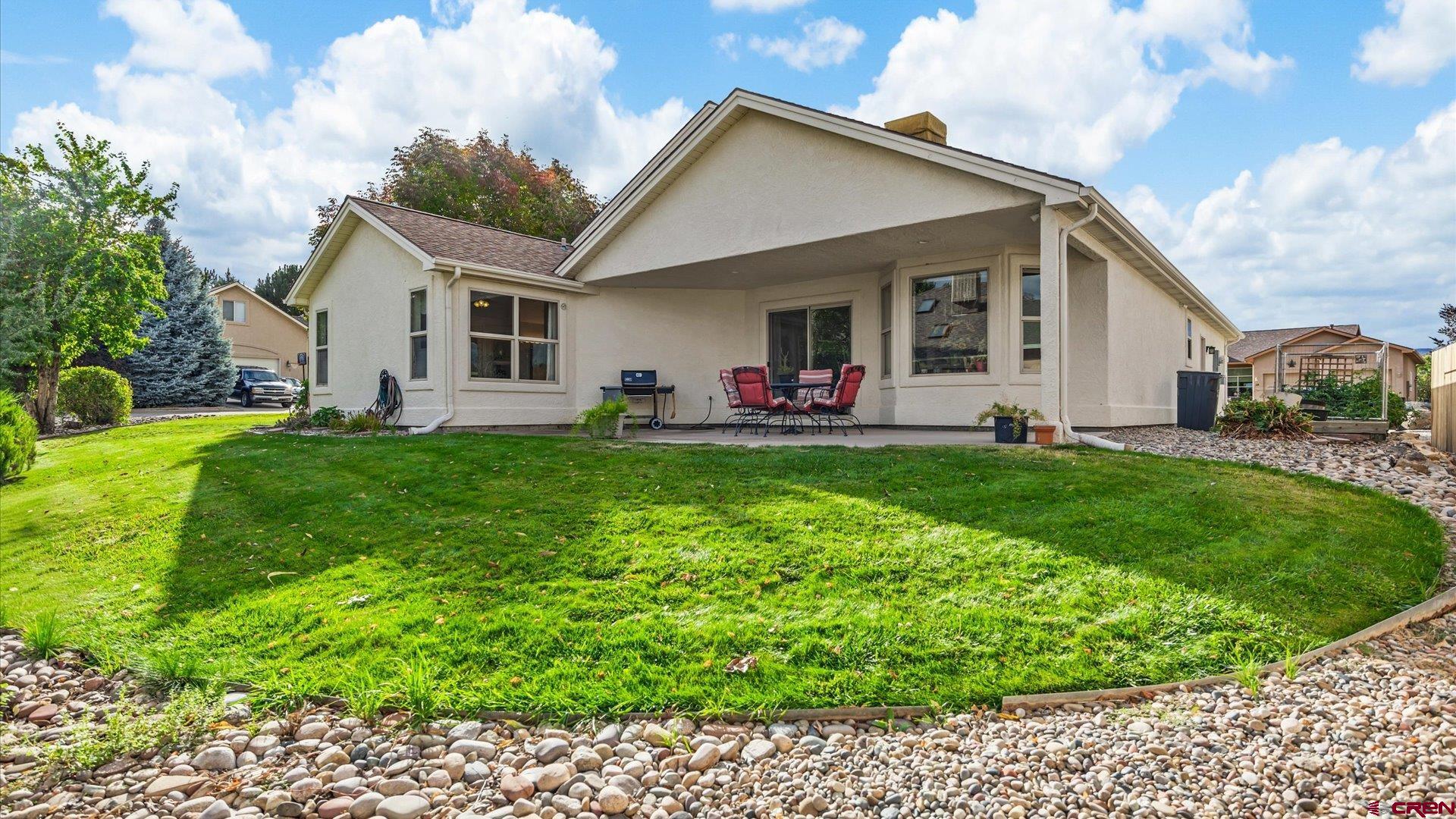 18 Willow Creek Court Parachute, CO 81635 - Photo 29 of 31 a front view of house with a garden and trees