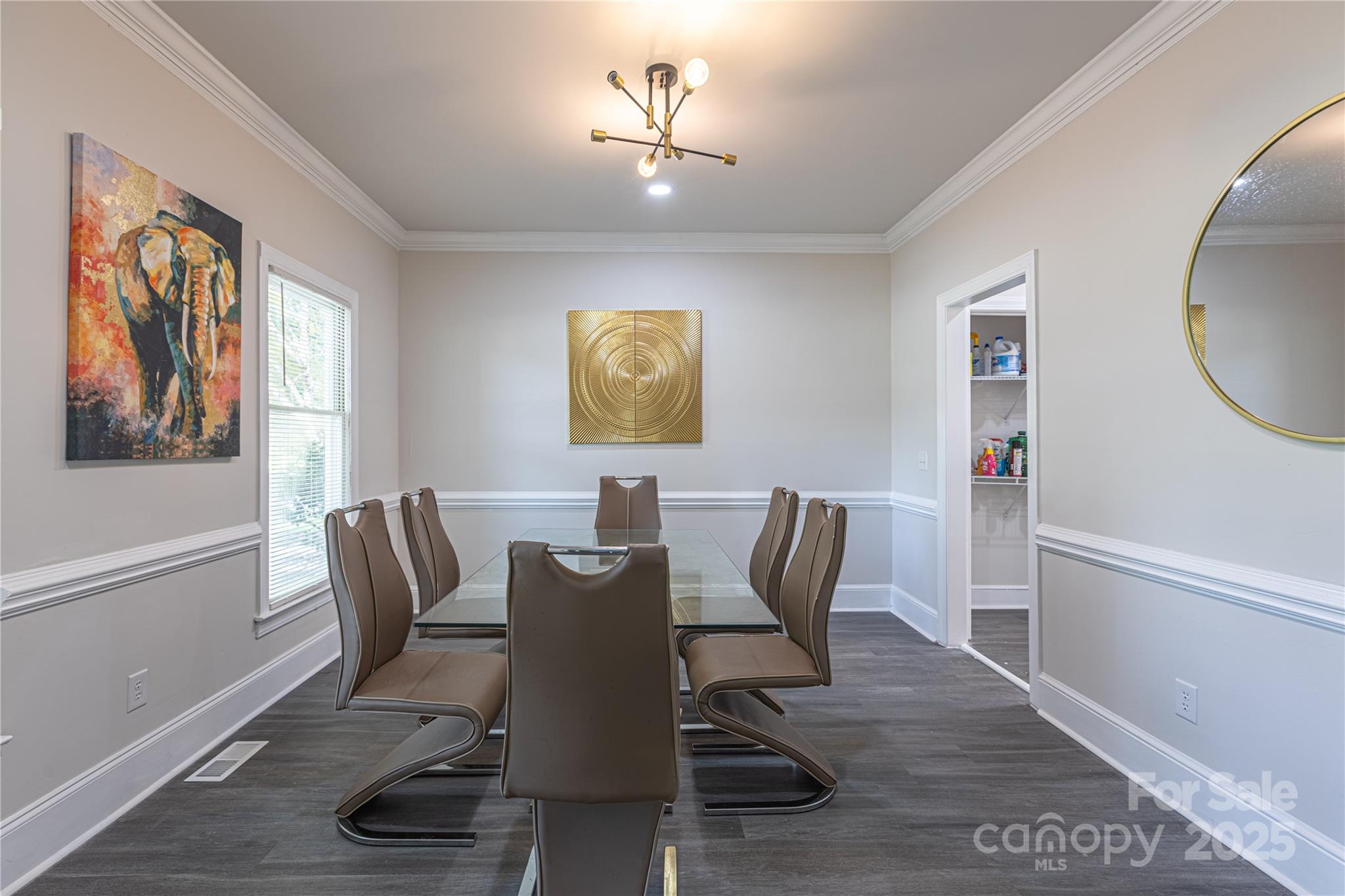 400 Millstone Road Florence, SC 29505 - Photo 11 of 48 a view of a dining room with furniture and wooden floor