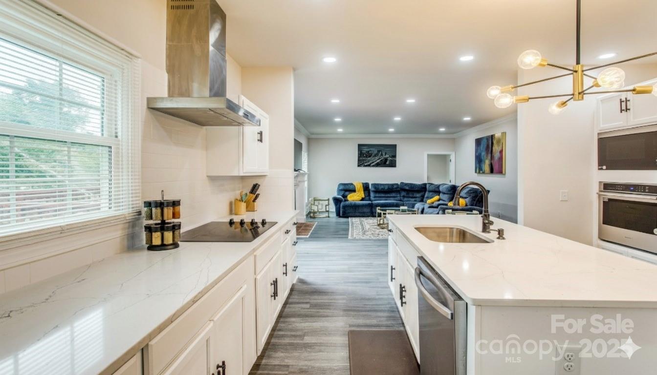 400 Millstone Road Florence, SC 29505 - Photo 12 of 48 a kitchen with counter top space a sink appliances and cabinets