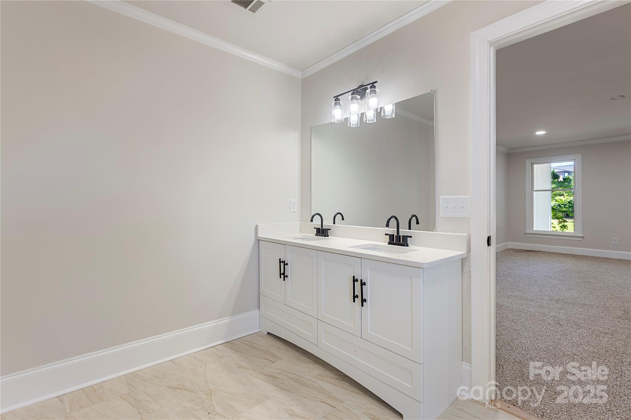 400 Millstone Road Florence, SC 29505 - Photo 28 of 48 a bathroom with a sink vanity and a mirror
