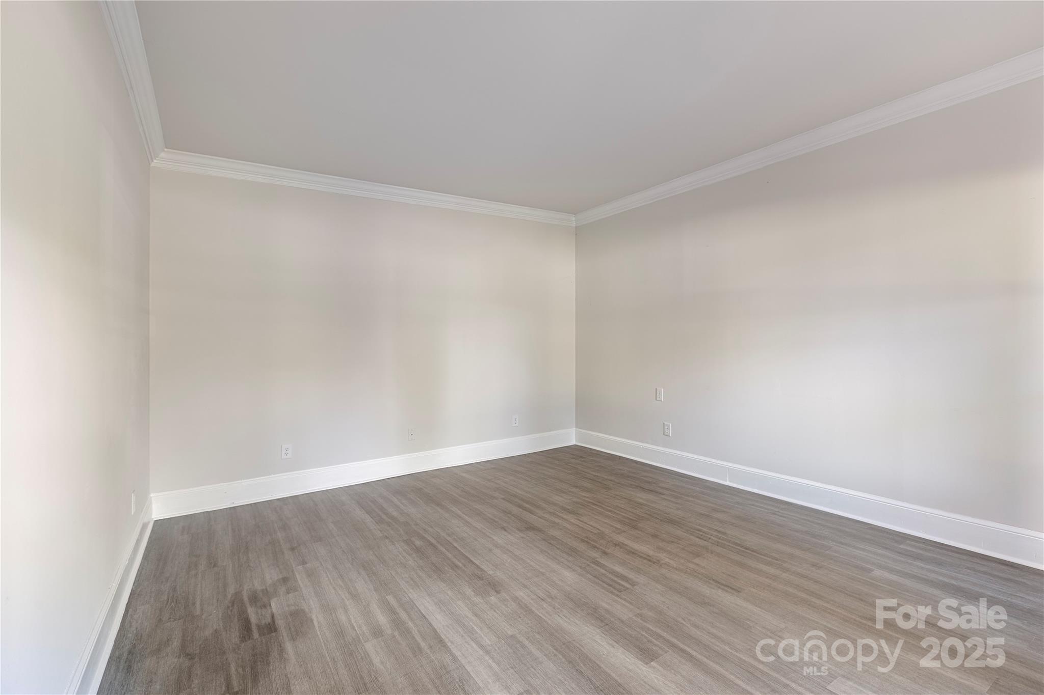400 Millstone Road Florence, SC 29505 - Photo 34 of 48 a view of an empty room with wooden floor