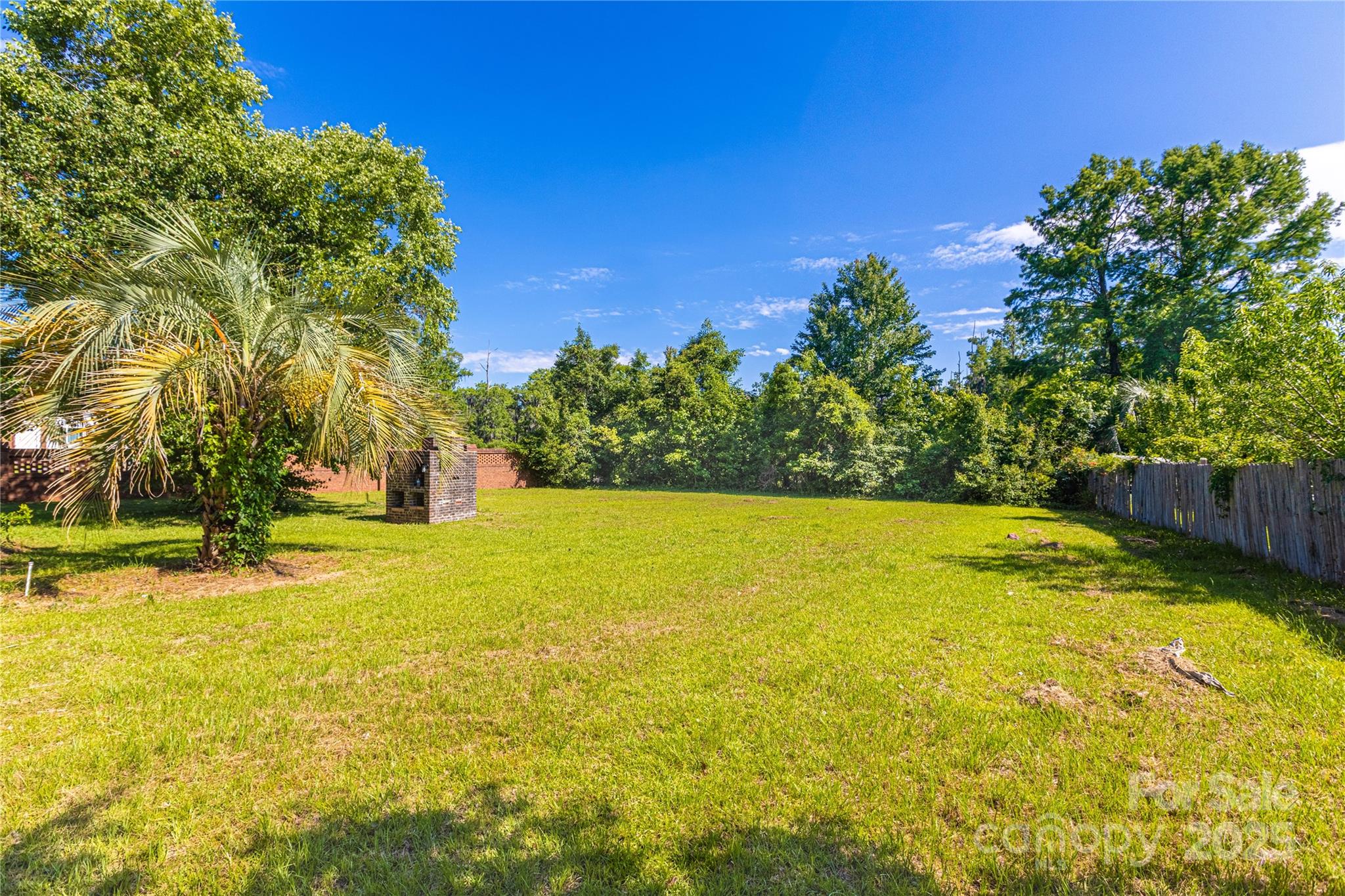 400 Millstone Road Florence, SC 29505 - Photo 41 of 48 a view of a swimming pool with an outdoor space and seating area
