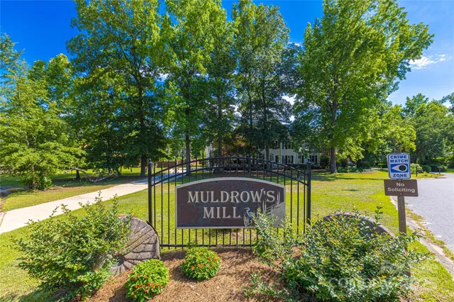 a sign on the side of the road