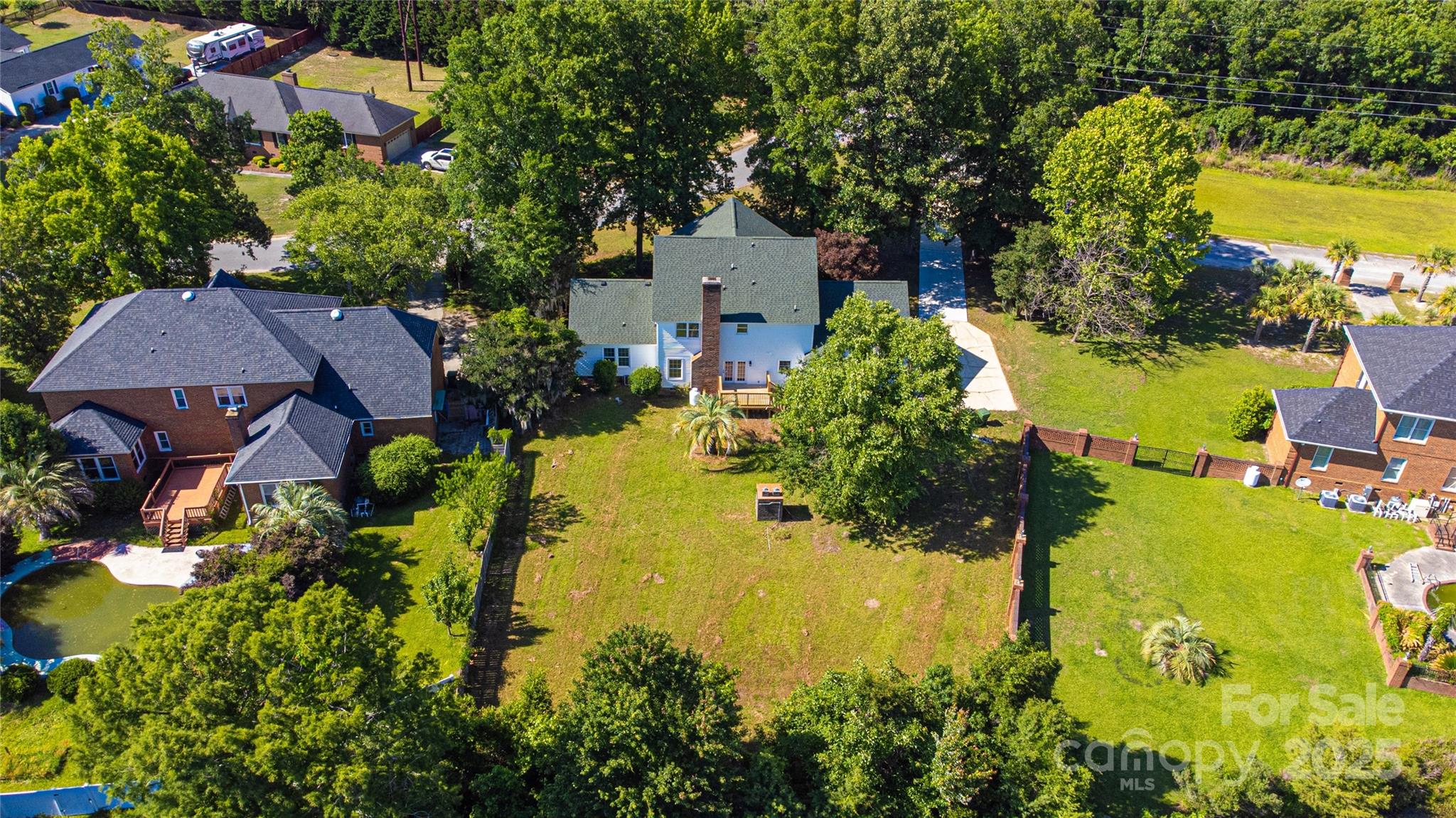 400 Millstone Road Florence, SC 29505 - Photo 46 of 48 an aerial view of residential houses with outdoor space and trees all around