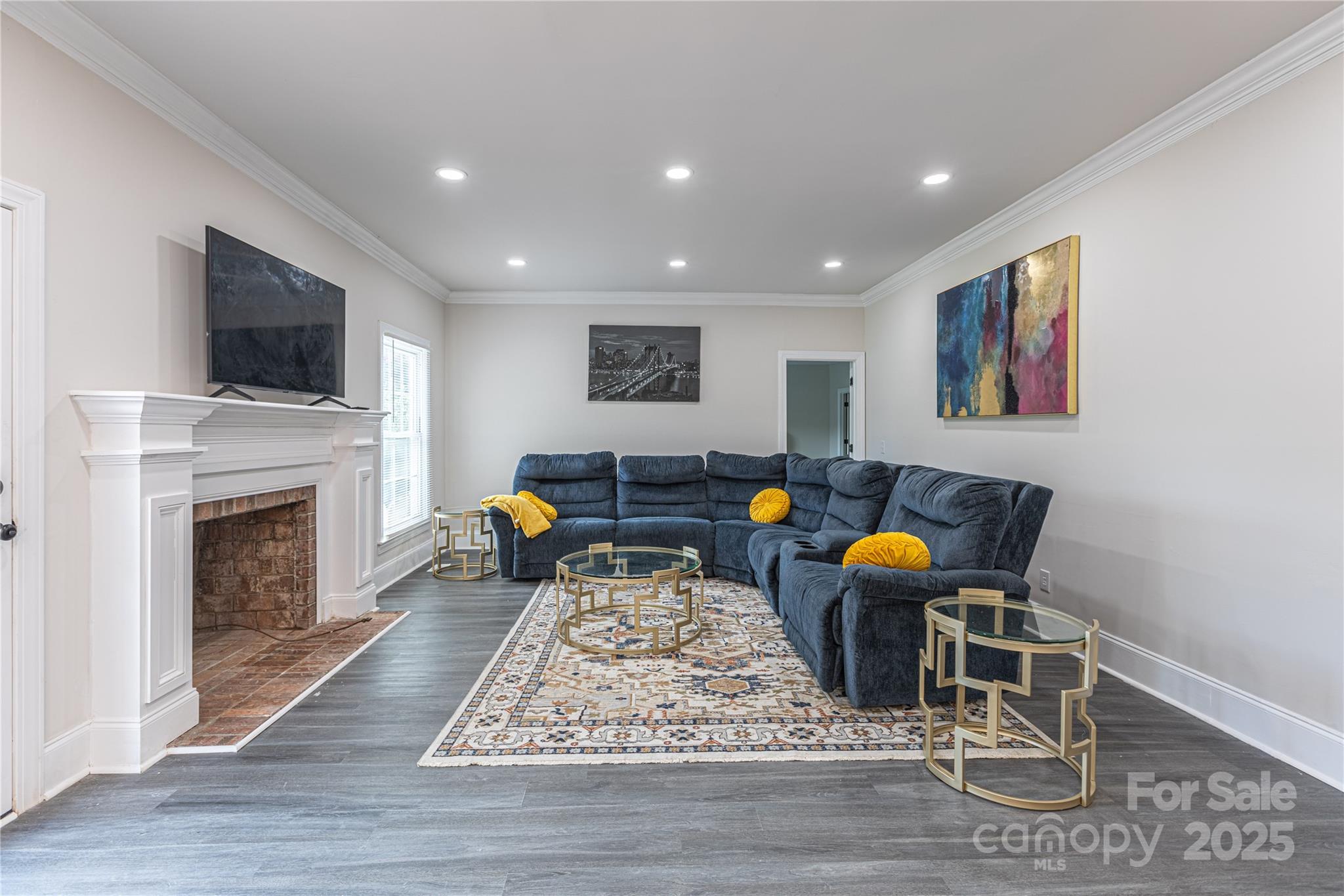 400 Millstone Road Florence, SC 29505 - Photo 6 of 48 a living room with furniture and a fireplace