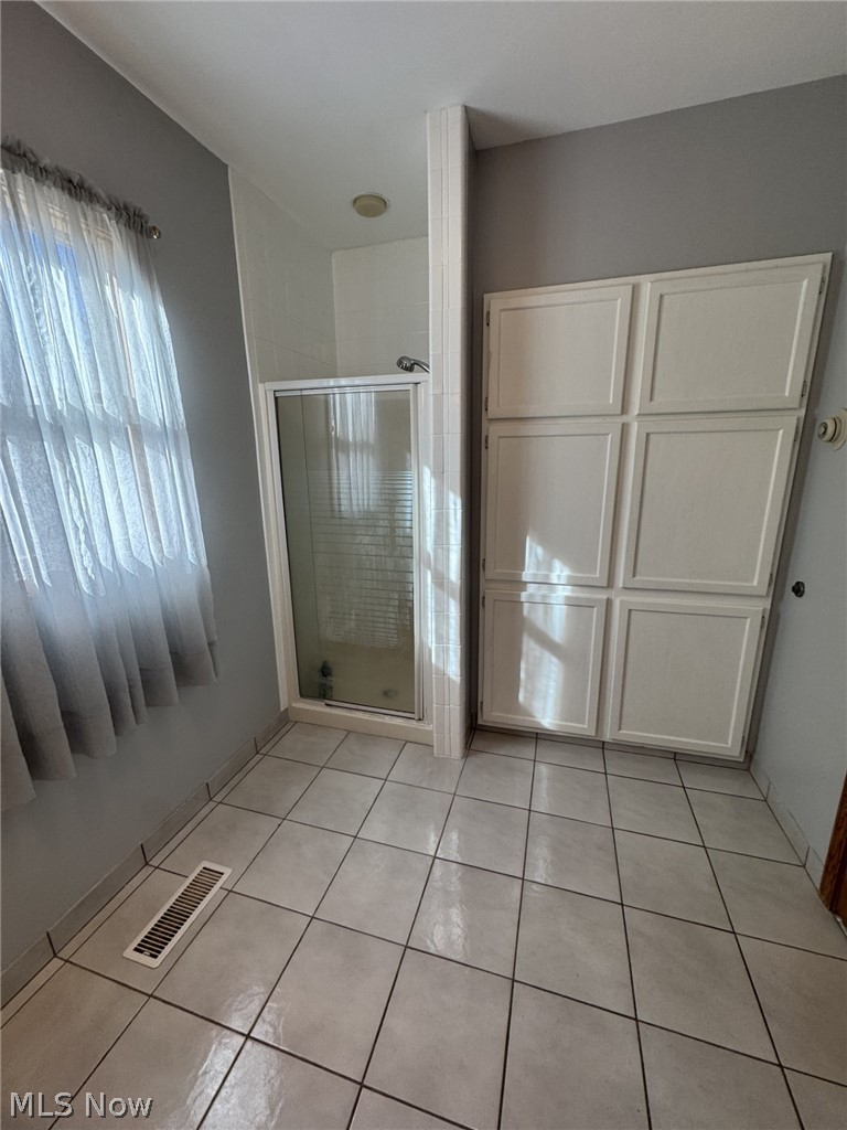 9990 Broadview Road Broadview Heights, OH 44147 - Photo 28 of 47 Full bathroom featuring a stall shower and light tile patterned floors