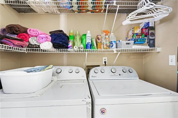 a utility room with dryer and washer
