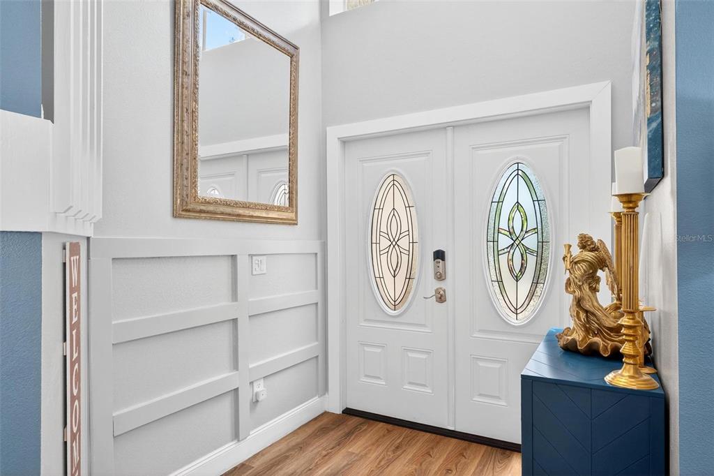 413 Rockafellow Way Orlando, FL 32828 - Photo 11 of 88 a view of a entryway with wooden floor