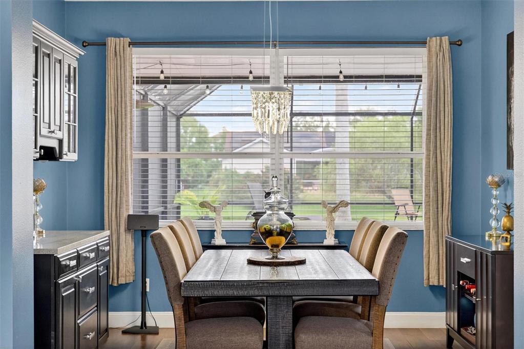 413 Rockafellow Way Orlando, FL 32828 - Photo 16 of 88 a view of a dining room with furniture window and outside view