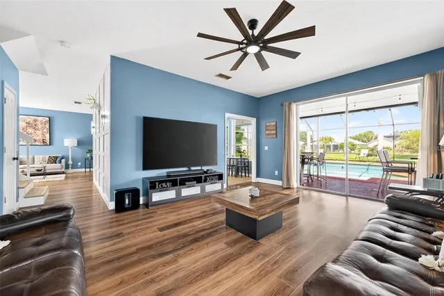 a kitchen with stainless steel appliances granite countertop a stove and a microwave