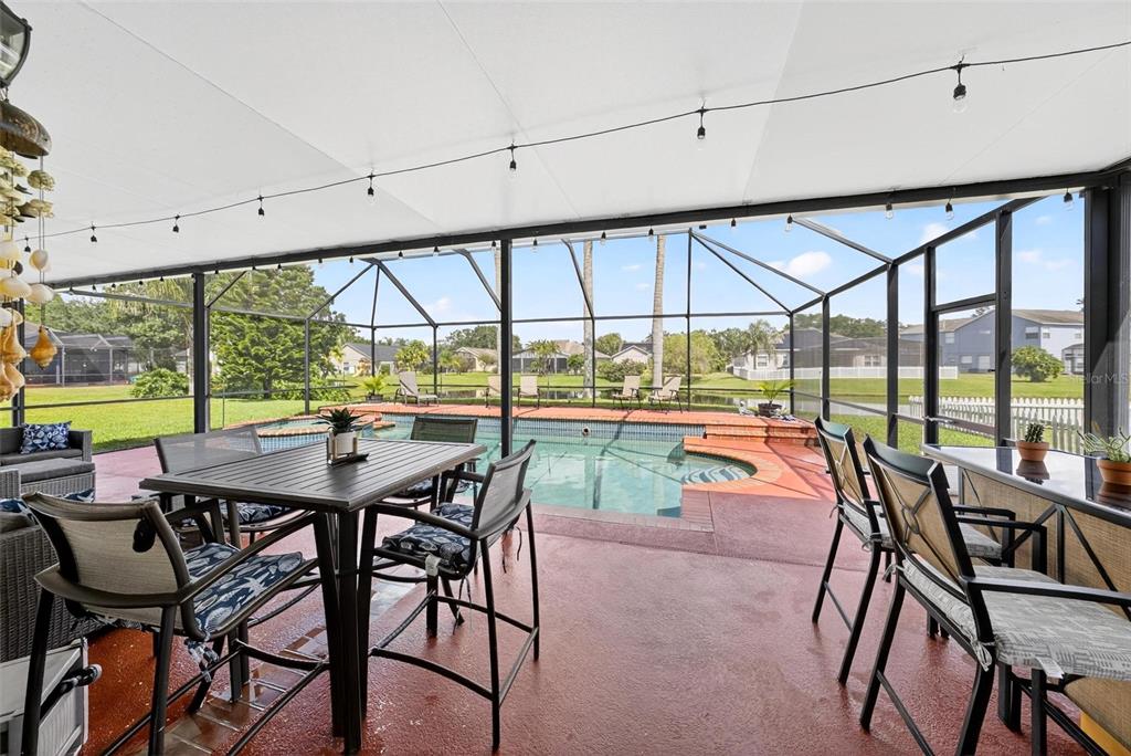 413 Rockafellow Way Orlando, FL 32828 - Photo 28 of 88 a view of a dining room with furniture window and outside view