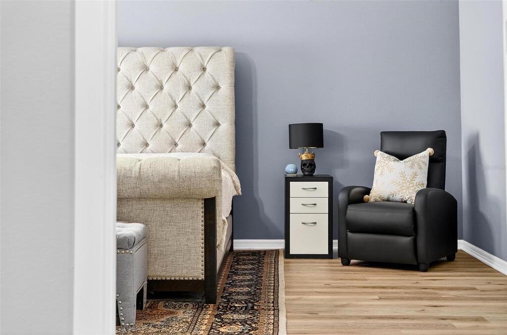 413 Rockafellow Way Orlando, FL 32828 - Photo 52 of 88 a living room with furniture and a wooden floor