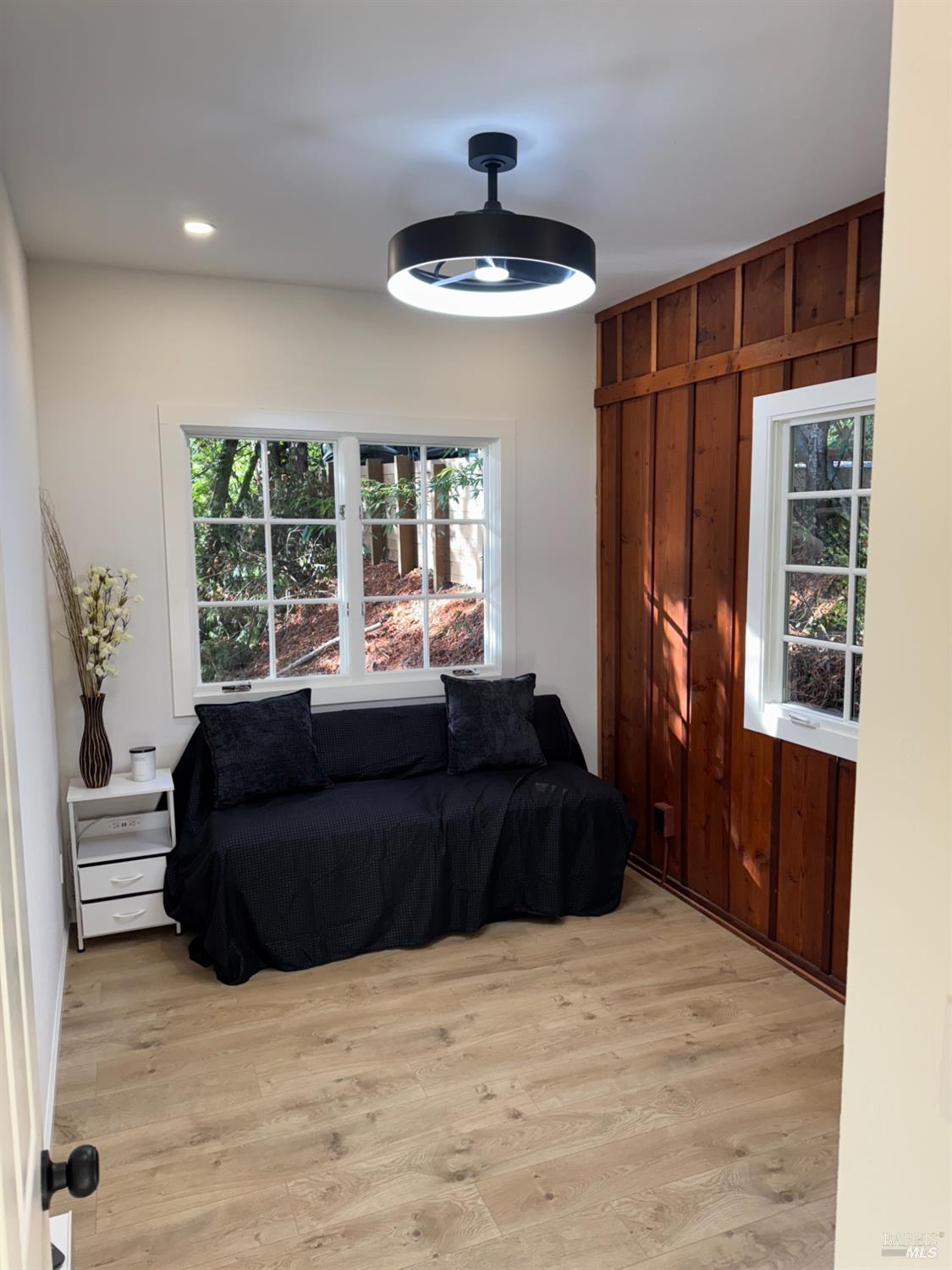 21883 Highway 116 Monte Rio, CA 95462 - Photo 16 of 28 a bedroom with a bed window and a potted plant