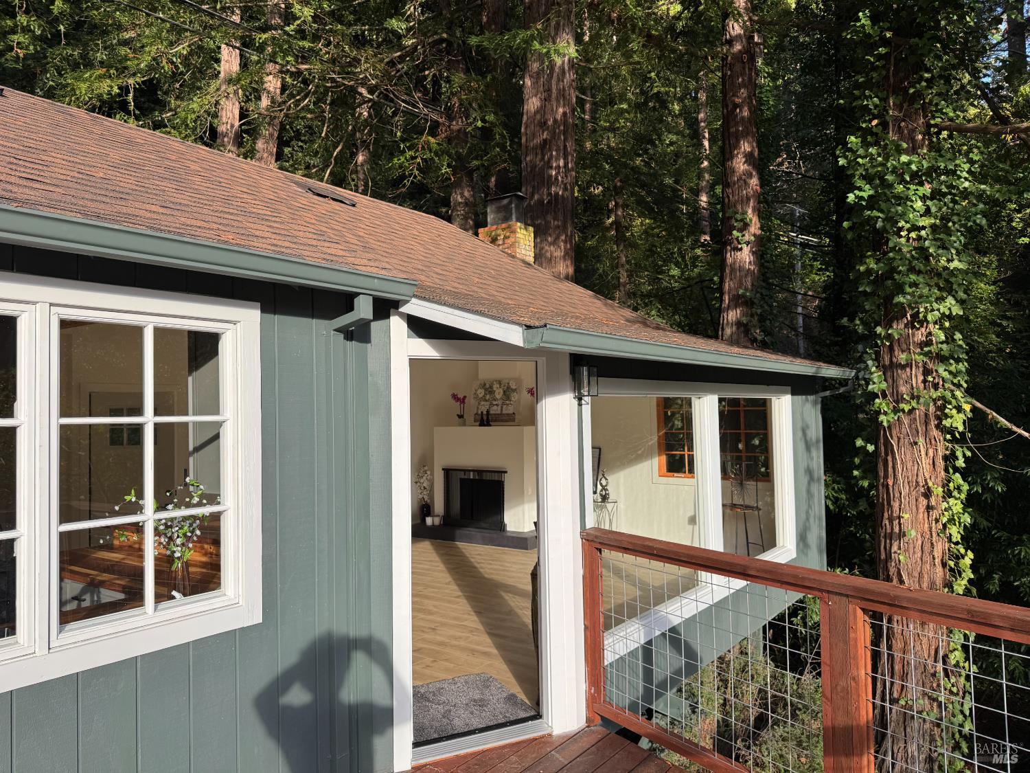 21883 Highway 116 Monte Rio, CA 95462 - Photo 5 of 28 a view of a house with a porch