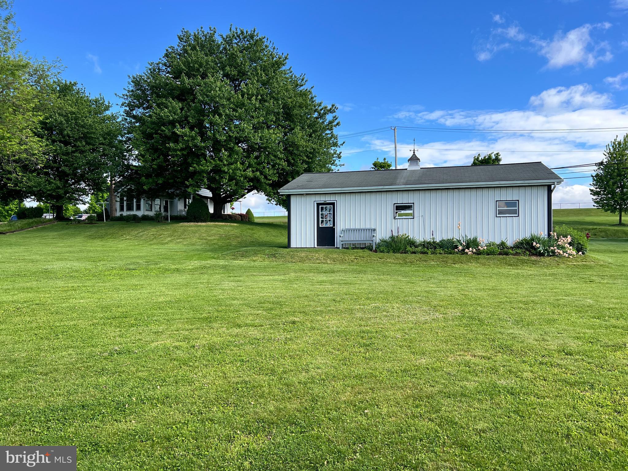 252 Doe Run Road Manheim, PA 17545 - Photo 22 of 32 a front view of house with yard and trees