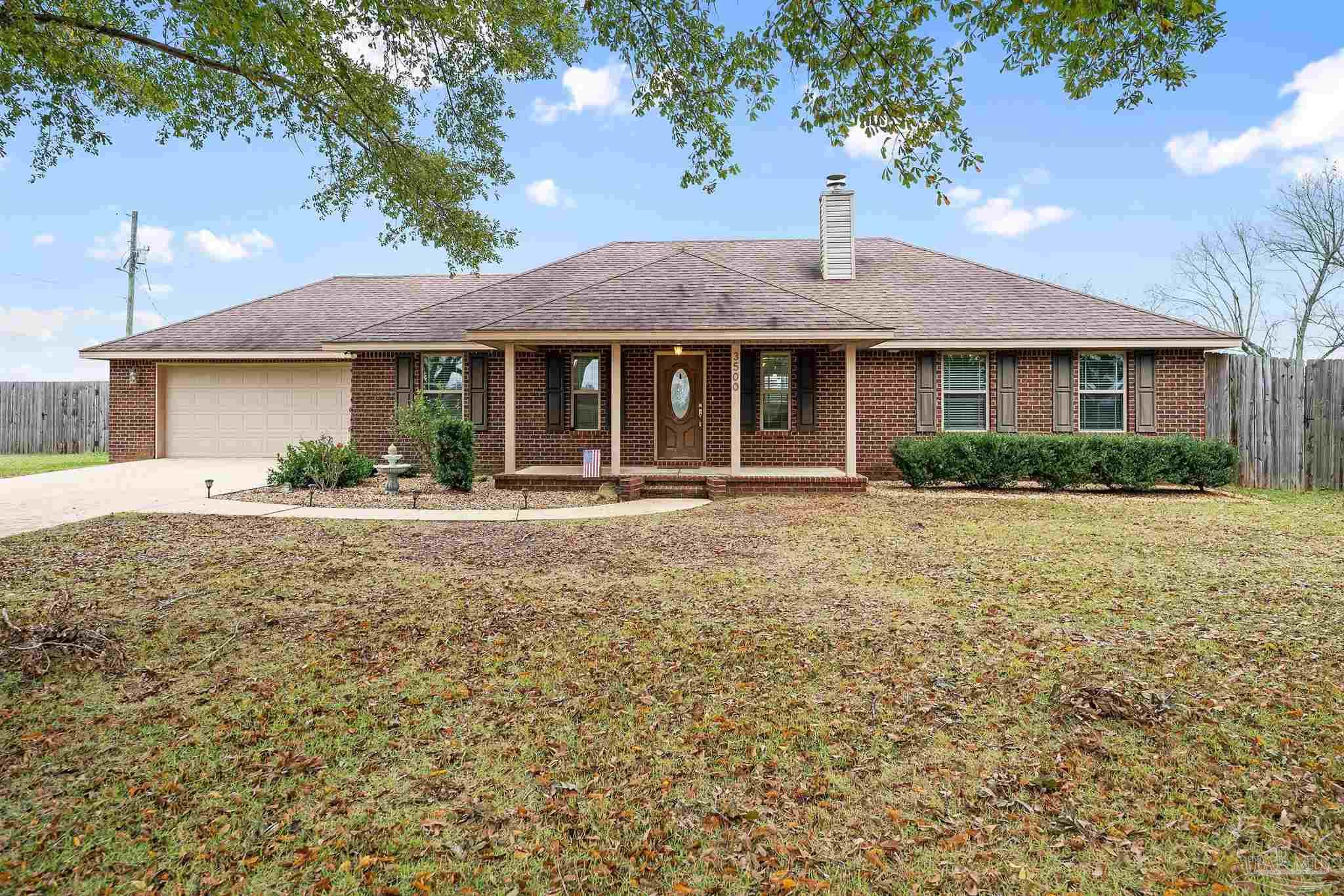 3500 Hazel Godwin Road Jay, FL 32565 - Photo 13 of 67 a front view of a house with garden