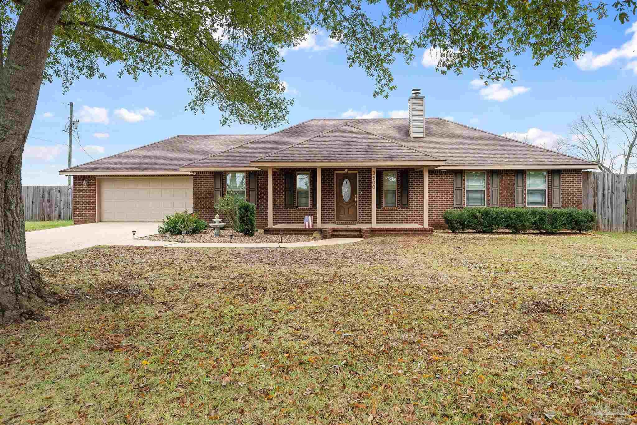 3500 Hazel Godwin Road Jay, FL 32565 - Photo 3 of 67 a front view of a house with garden