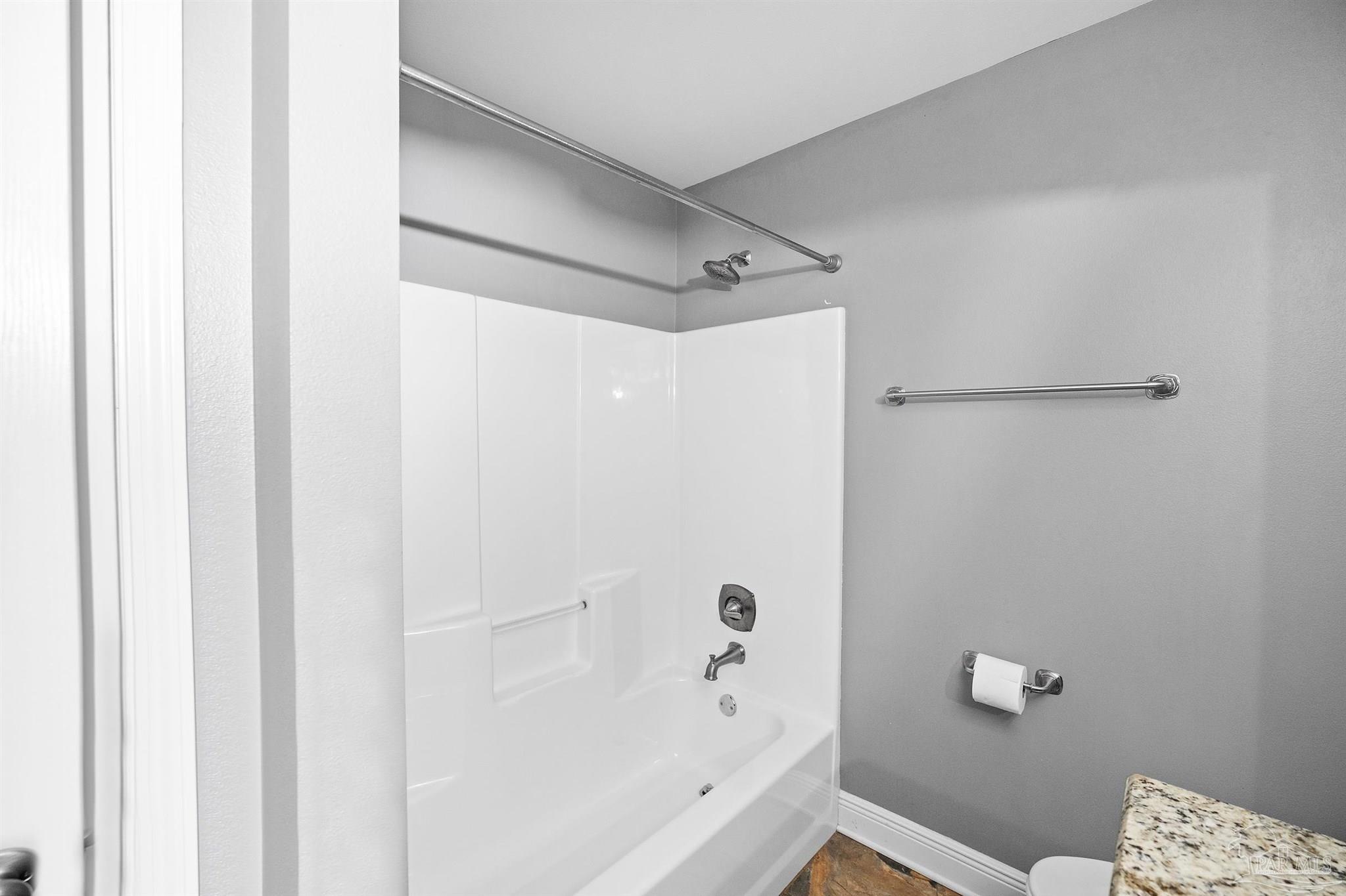 3500 Hazel Godwin Road Jay, FL 32565 - Photo 36 of 67 a bathroom with a bathtub and a shower