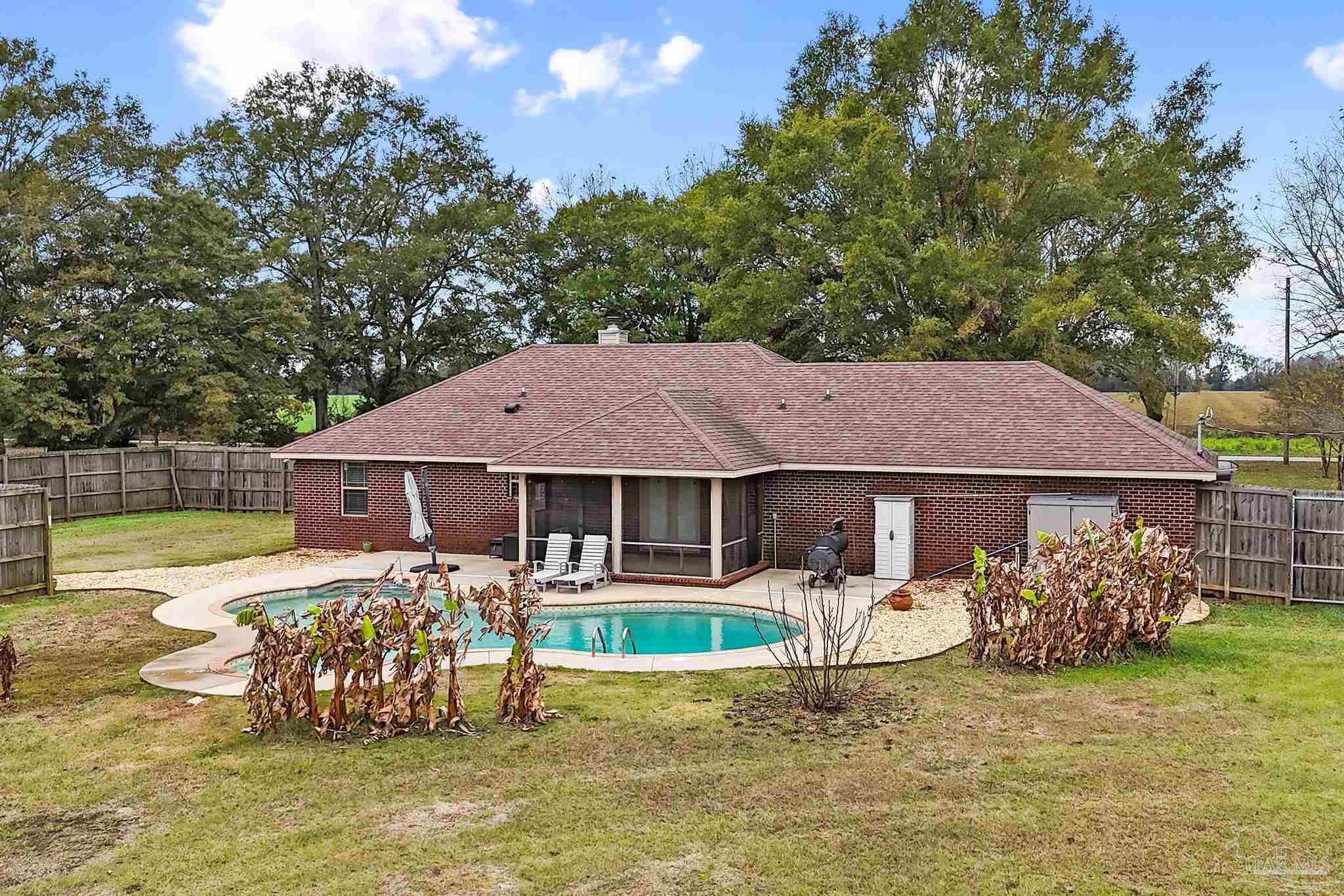 3500 Hazel Godwin Road Jay, FL 32565 - Photo 48 of 67 a front view of a house with garden