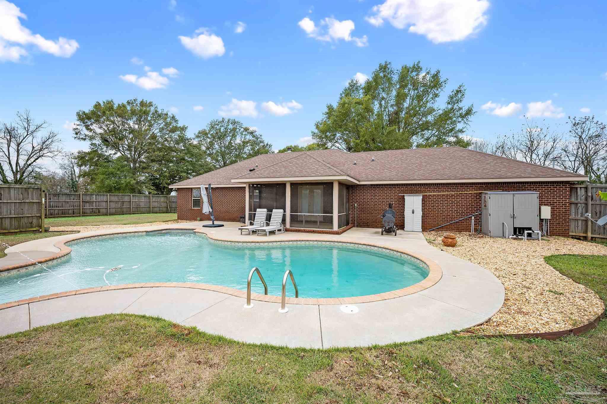 3500 Hazel Godwin Road Jay, FL 32565 - Photo 54 of 67 a view of a house with swimming pool and sitting area