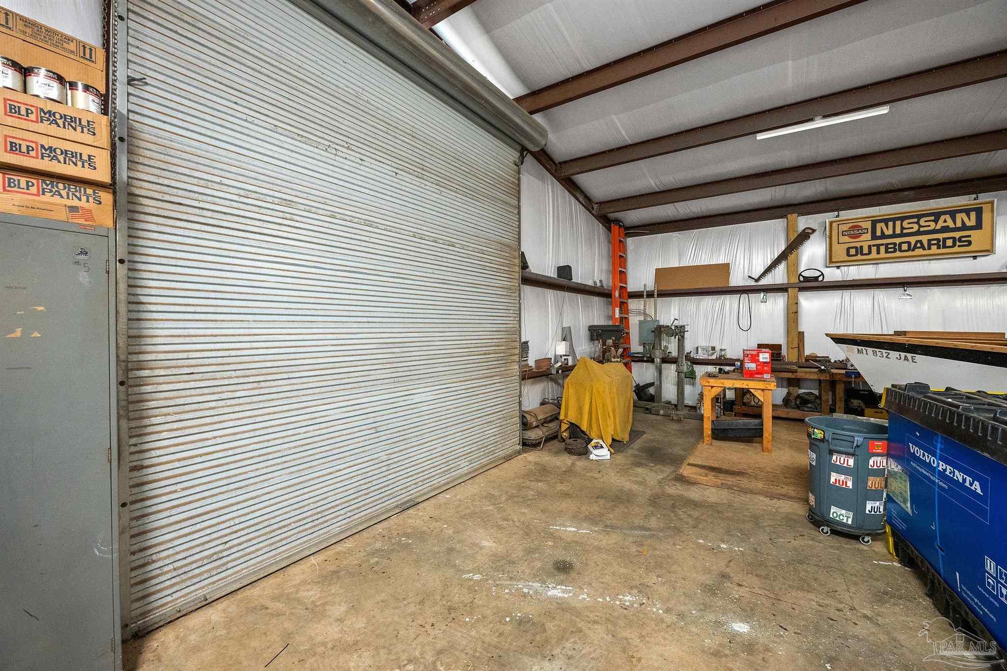 3500 Hazel Godwin Road Jay, FL 32565 - Photo 60 of 67 a view of a storage room with a lot of stuff