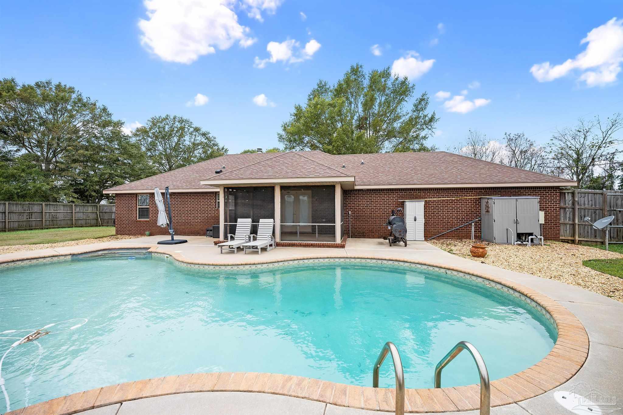 3500 Hazel Godwin Road Jay, FL 32565 - Photo 7 of 67 a view of a house with swimming pool and sitting area