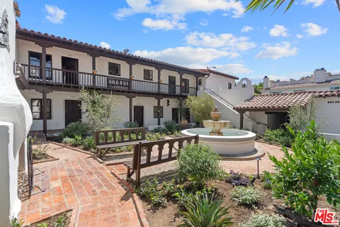 a view of house with patio outdoor seating
