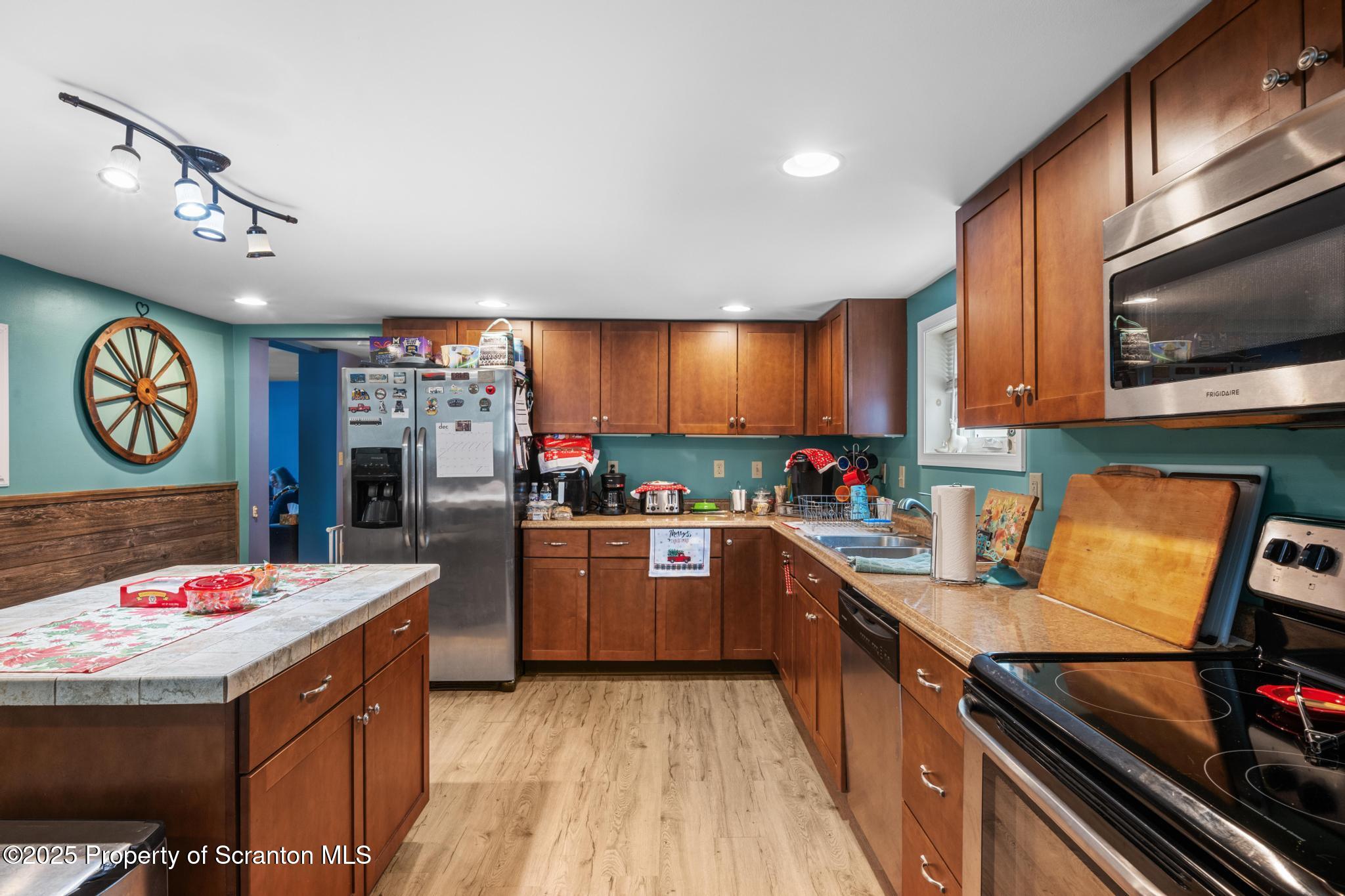 205 South Valley Avenue Olyphant, PA 18447 - Photo 20 of 44 a kitchen with lots of counter top space and appliances