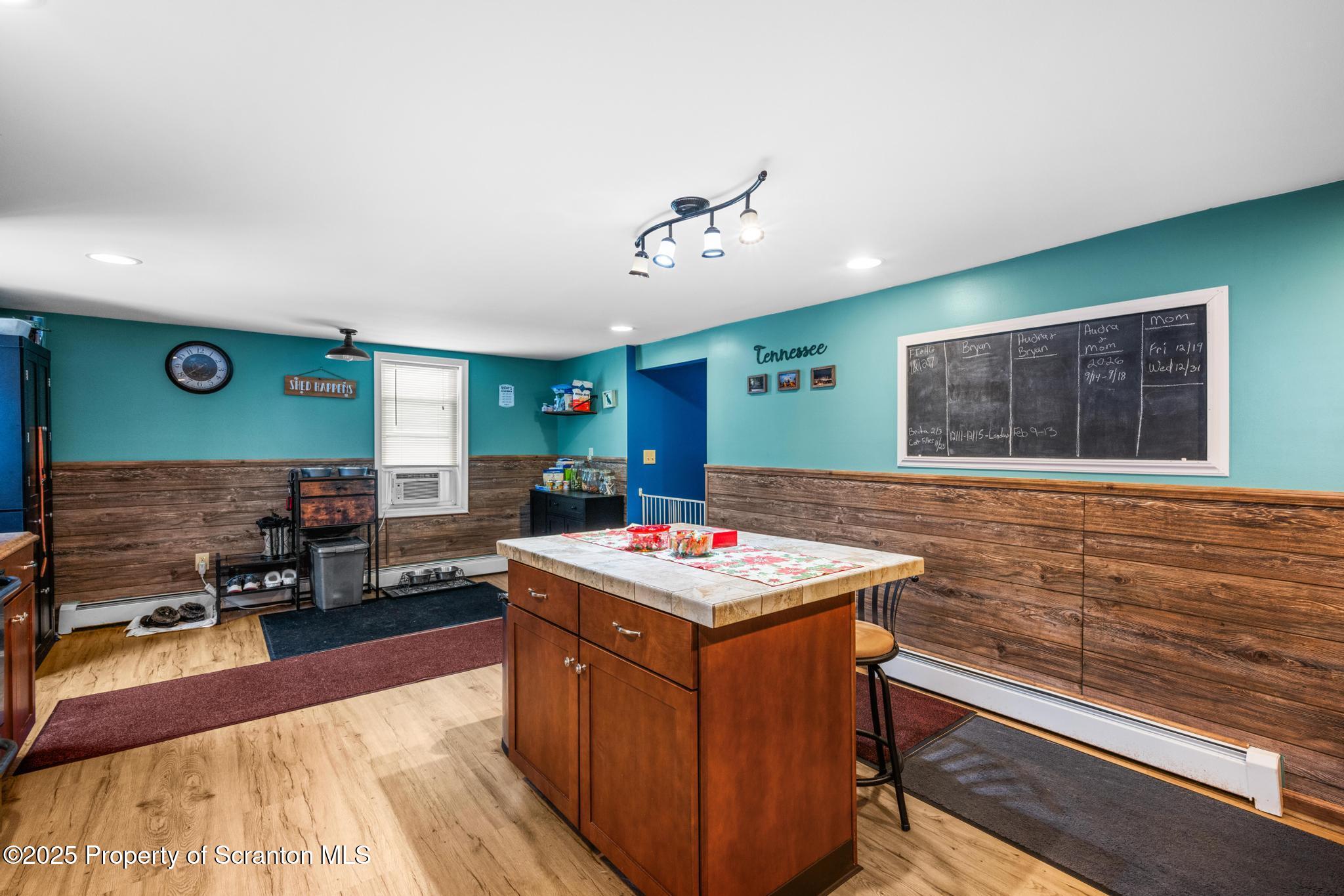 205 South Valley Avenue Olyphant, PA 18447 - Photo 24 of 44 a kitchen that has a stove and a table