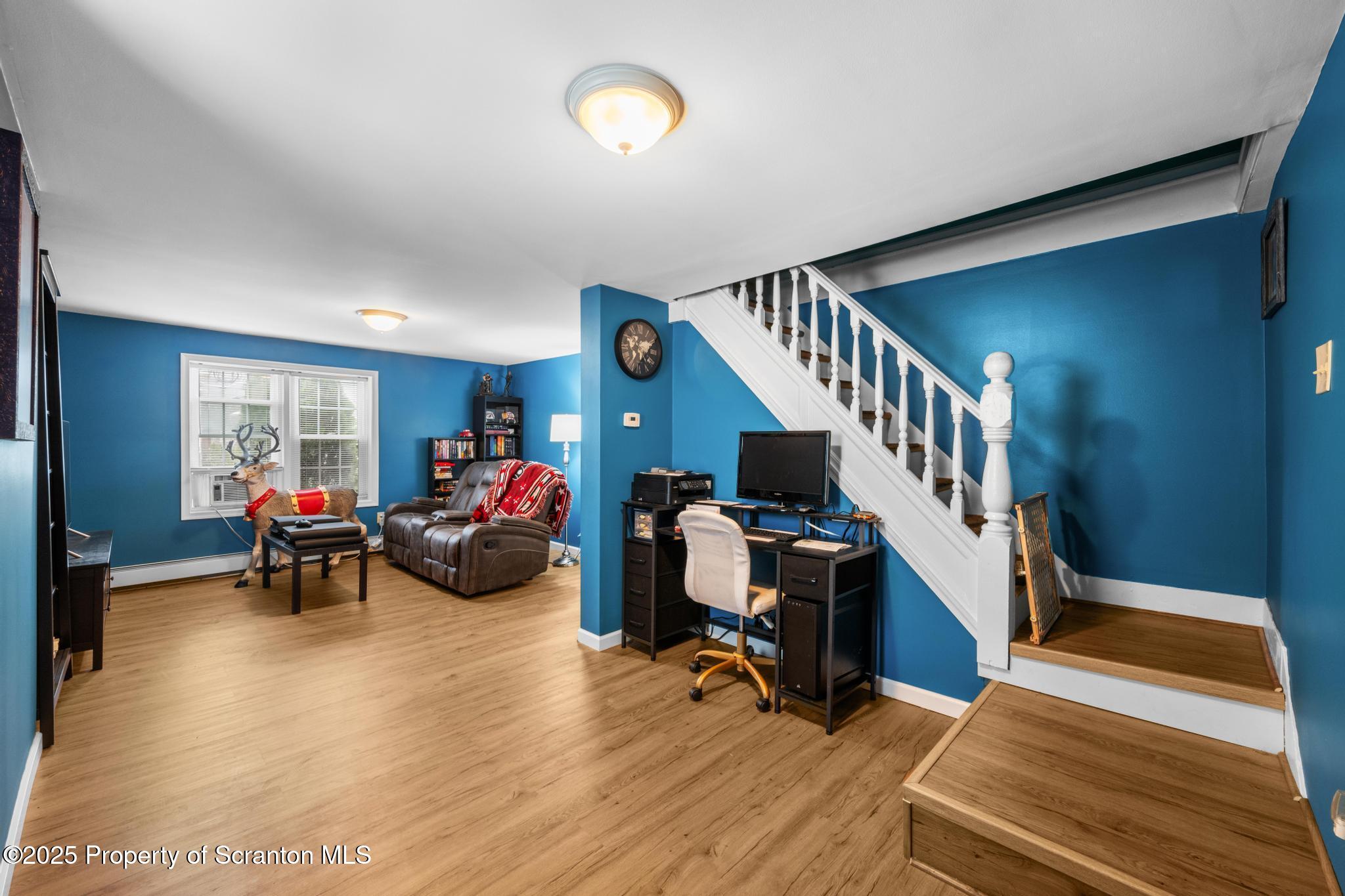 205 South Valley Avenue Olyphant, PA 18447 - Photo 28 of 44 a view of a livingroom with workspace and furniture