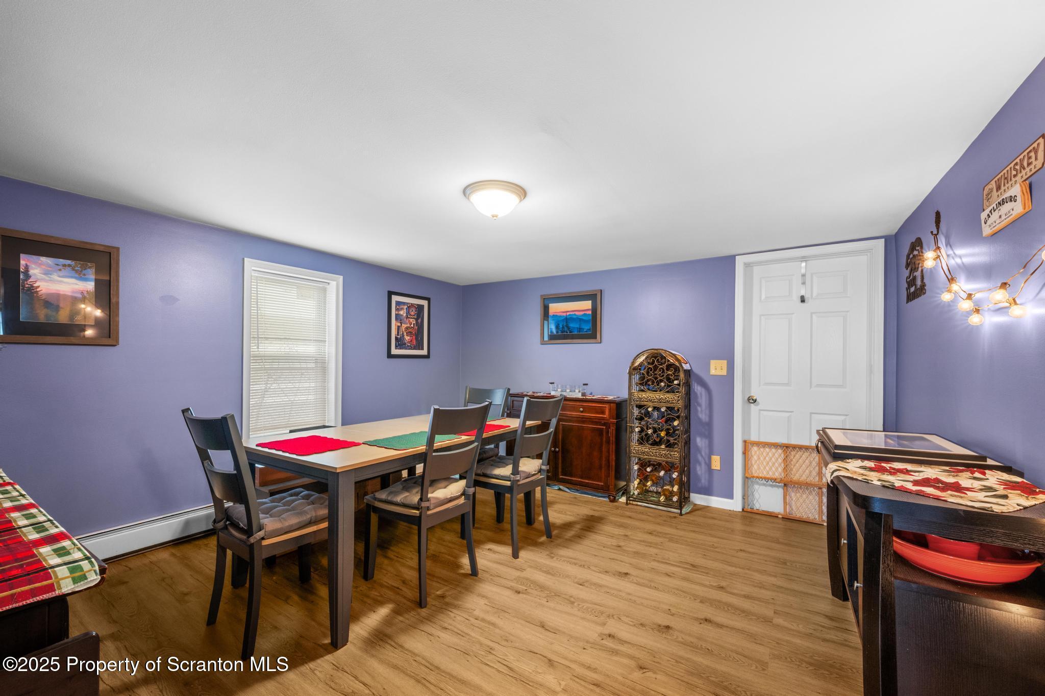 205 South Valley Avenue Olyphant, PA 18447 - Photo 32 of 44 a view of a dining room with furniture and wooden floor
