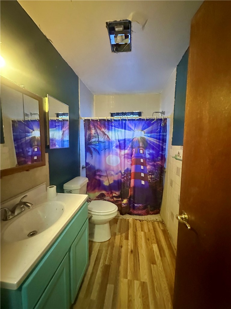 801 Ruben Chavez Road Robstown, TX 78380 - Photo 11 of 18 a bathroom with a sink and a mirror