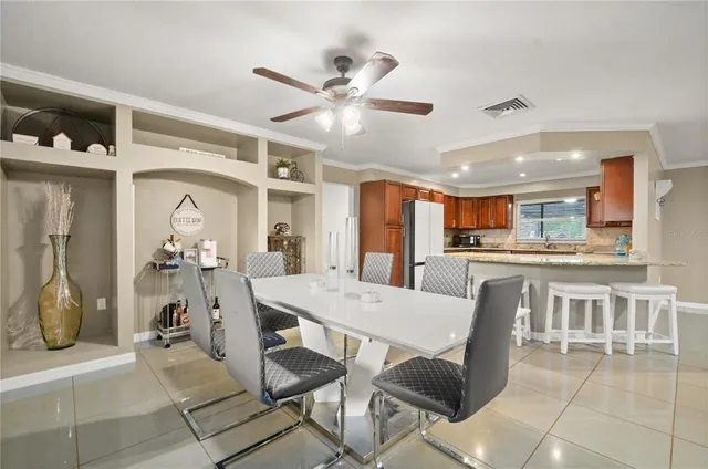 a view of a dining room with furniture