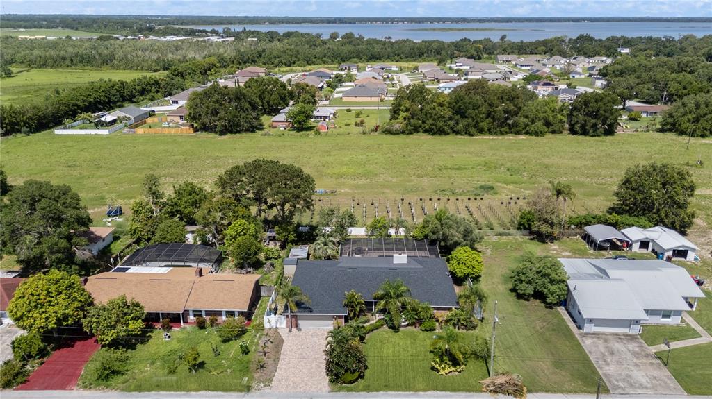 209 7th Street South Dundee, FL 33838 - Photo 34 of 36 an aerial view of a houses with a yard