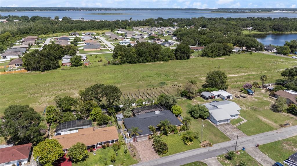209 7th Street South Dundee, FL 33838 - Photo 35 of 36 an aerial view of residential houses with outdoor space