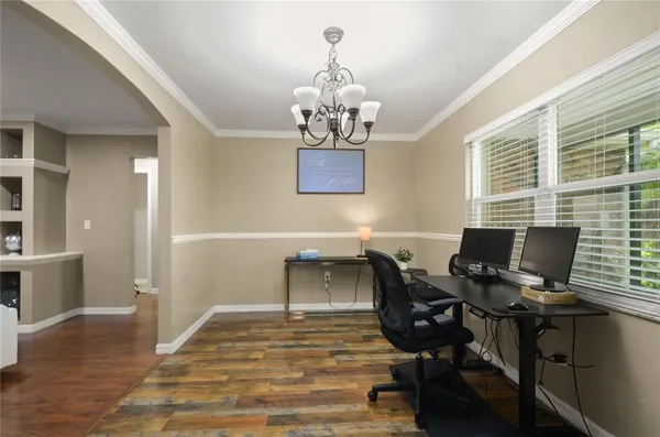 a workspace with wooden floor